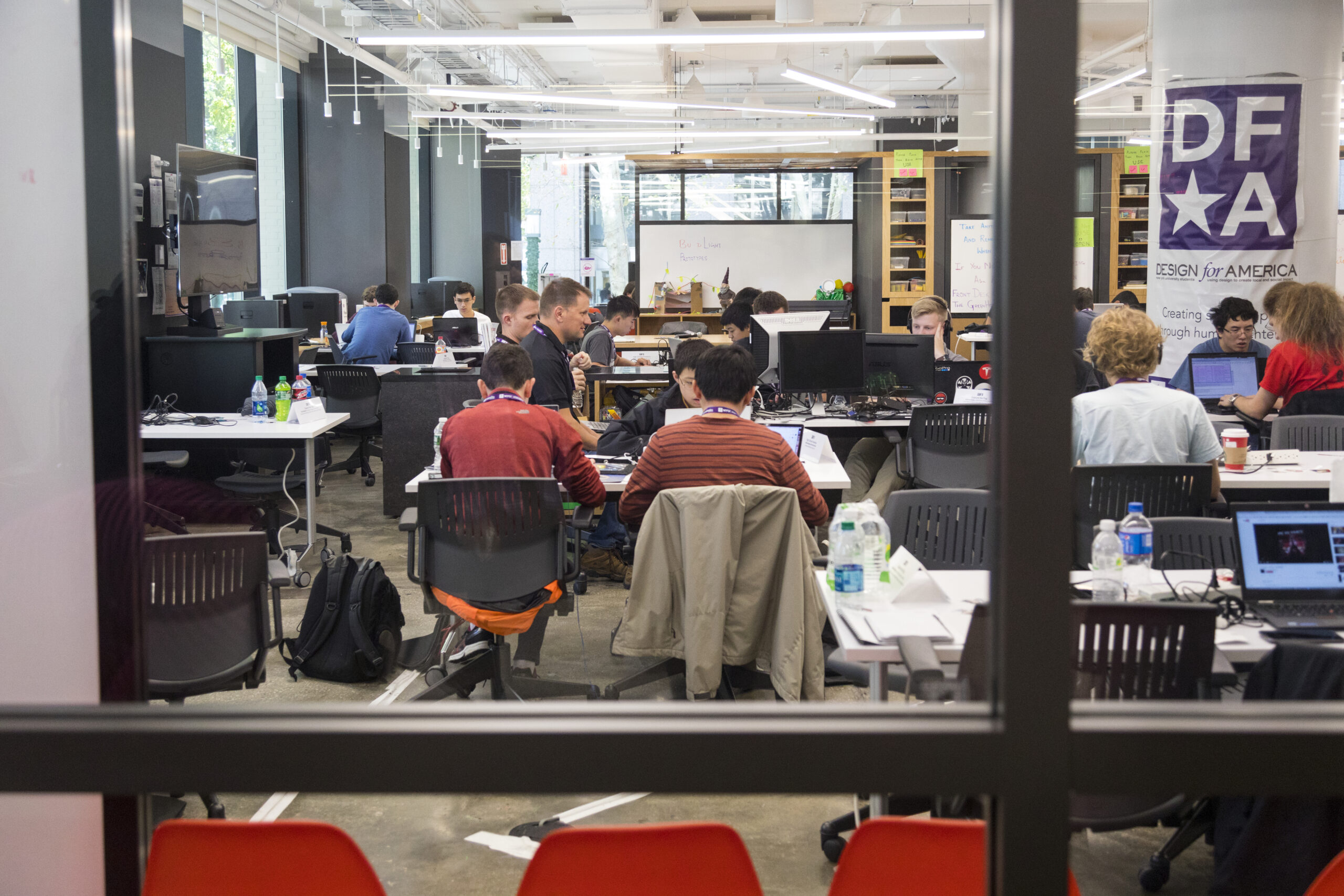 Students working in a study space together in Tandon