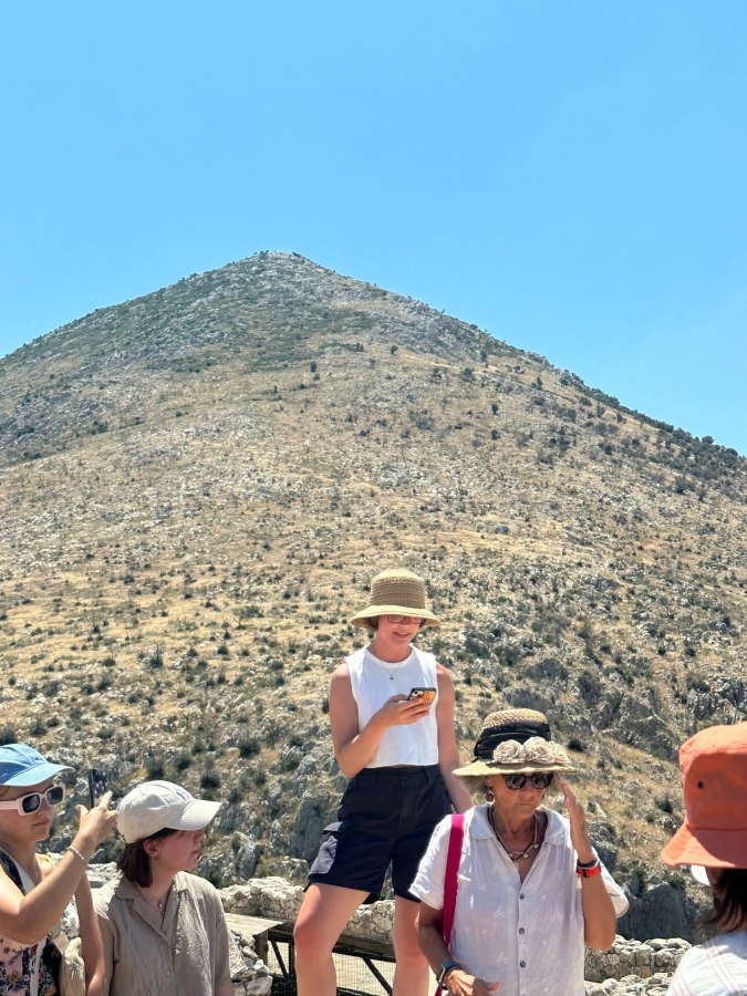 The author presenting the site of Mycenae to her program.