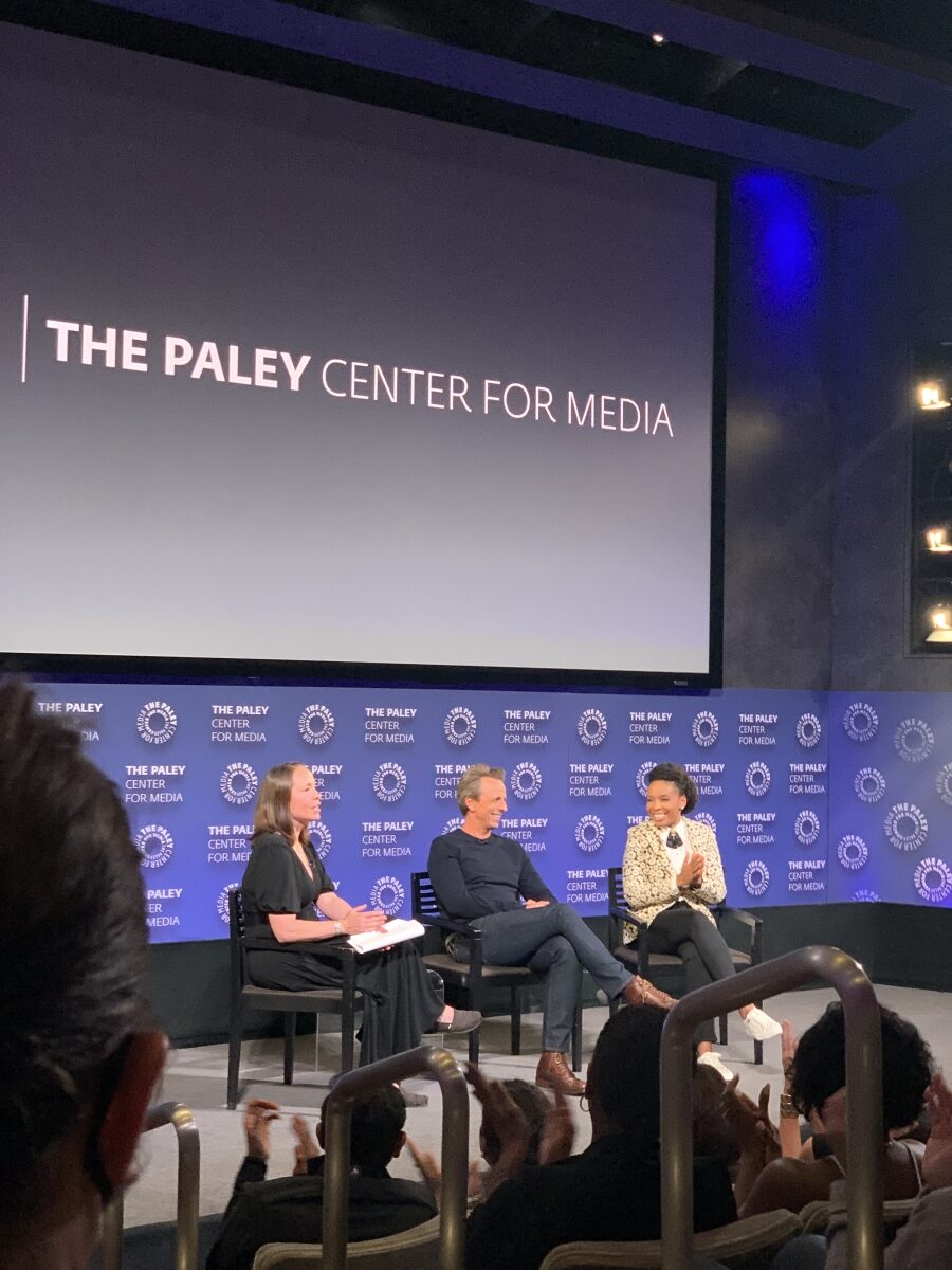 Seth Meyers and Amber Ruffin speaking with a moderator at a Paley Center Media event.