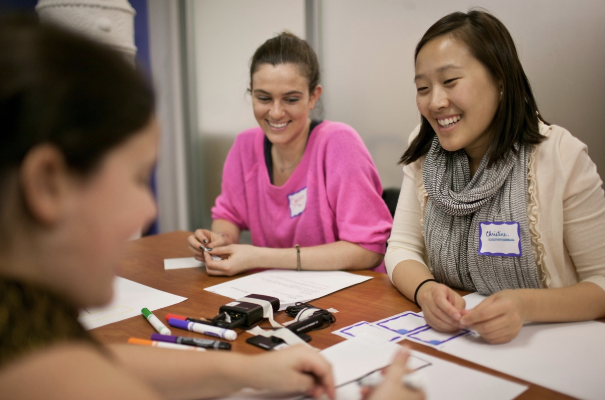 Students working together at a table.