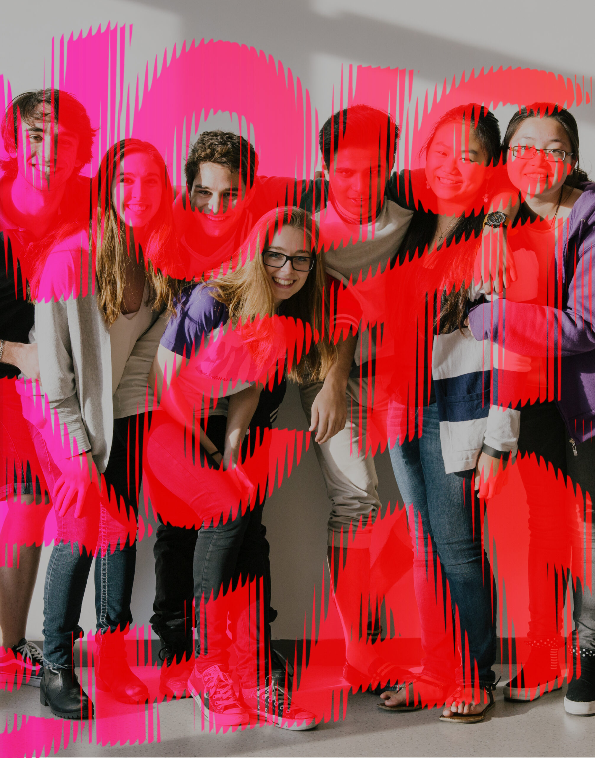 A group of students posing together with a red overlay of the words “Voice,” “Action,” and “Change.”
