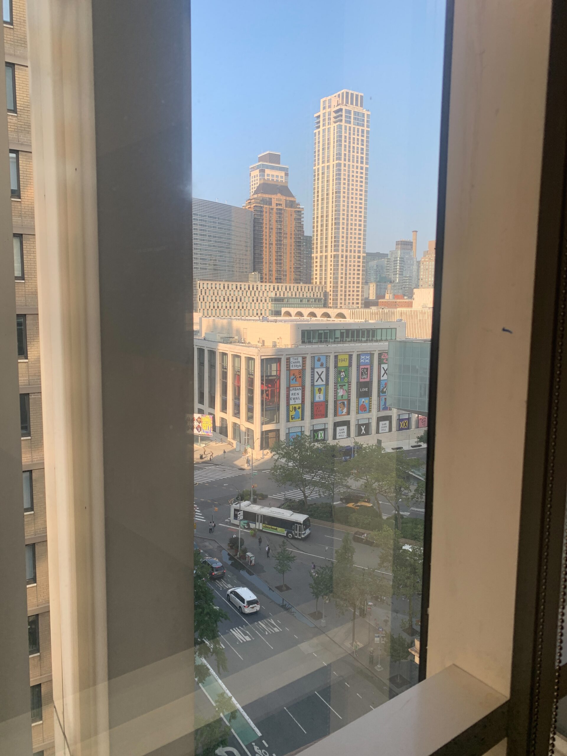 An office window overlooking New York City.
