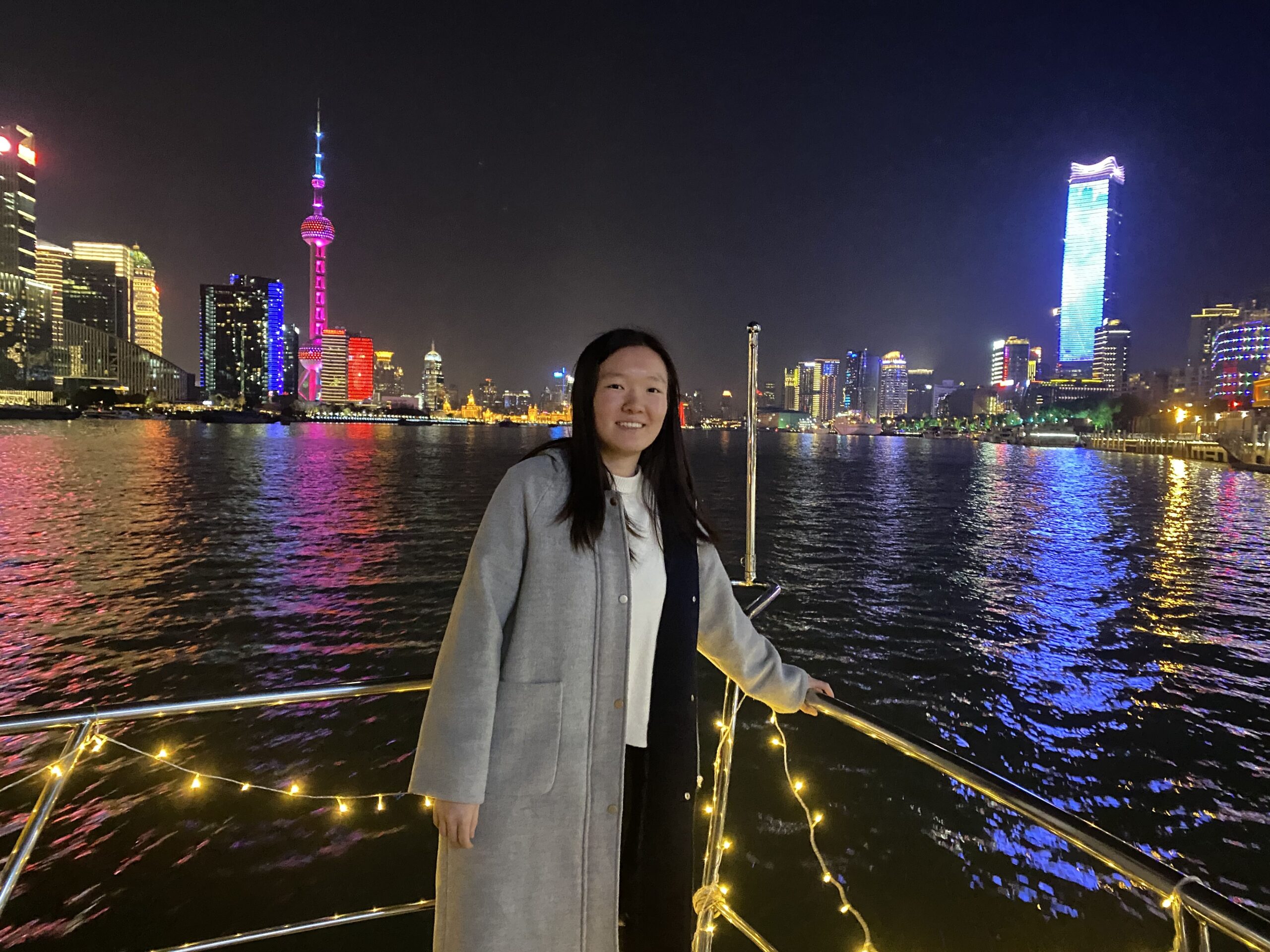 Me celebrating my friend's birthday on Huangpu River in front of Oriental Pearl Tower
