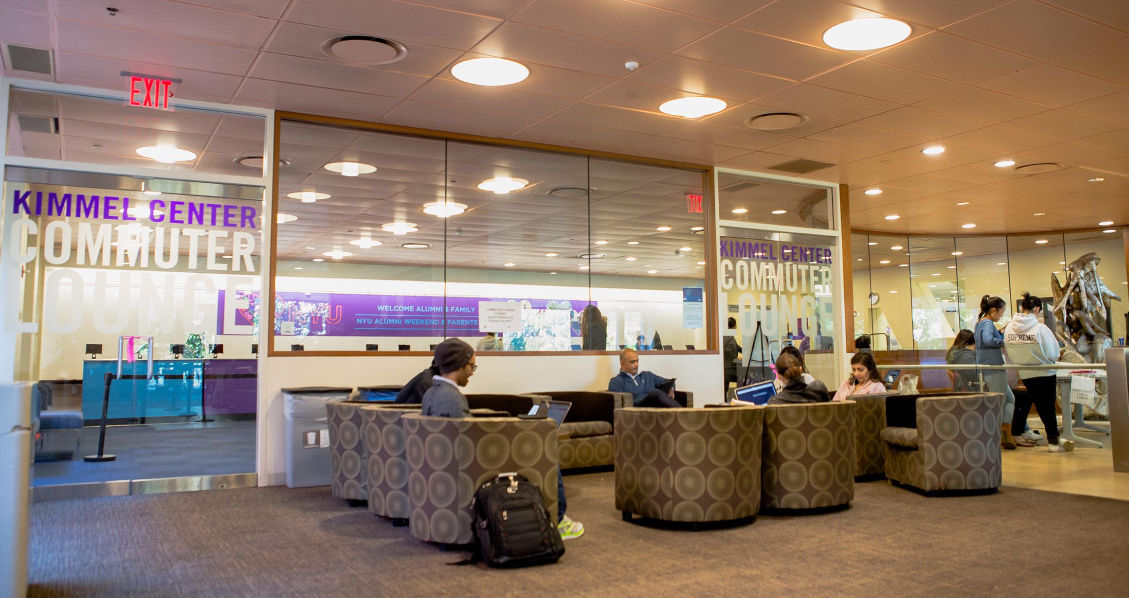 Students studying in the Commuter Lounge of the Kimmel Center.