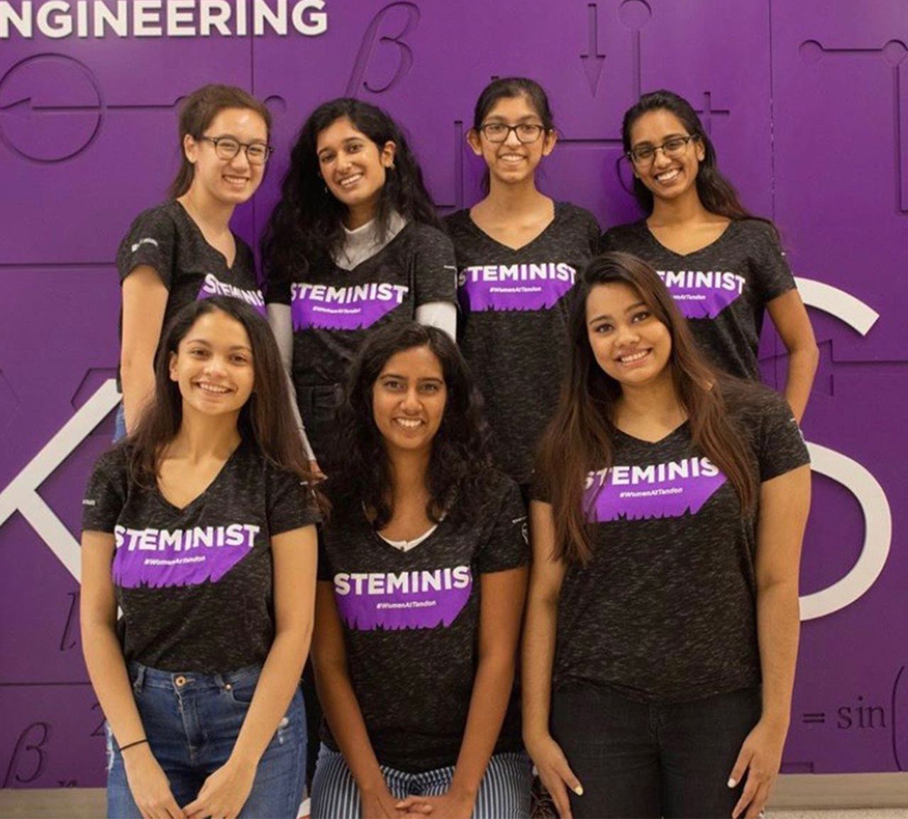 Seven female-presenting members of of the STEMinist club at NYU.