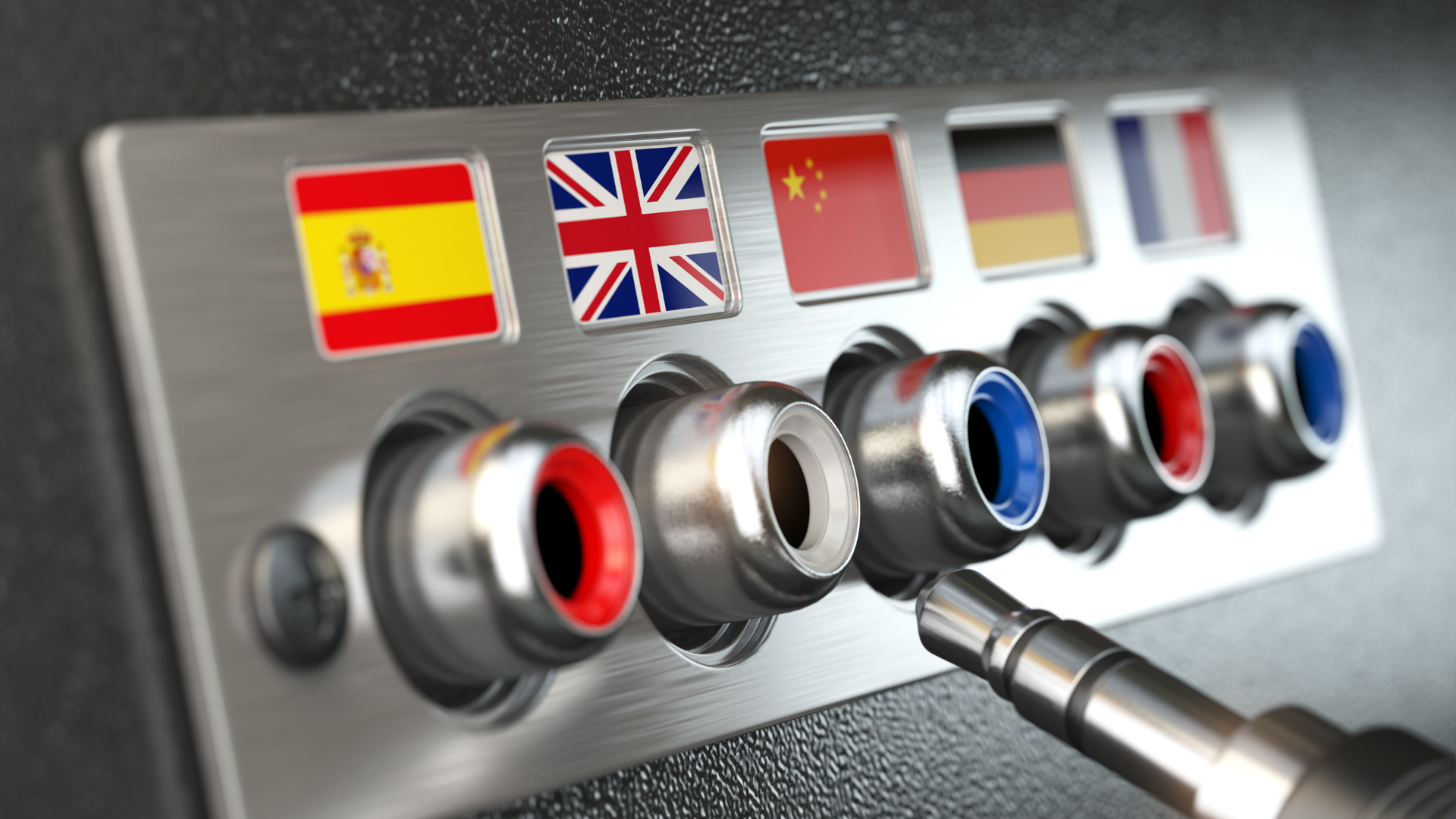 An aux cord plugs into jacks with flags of different languages represented