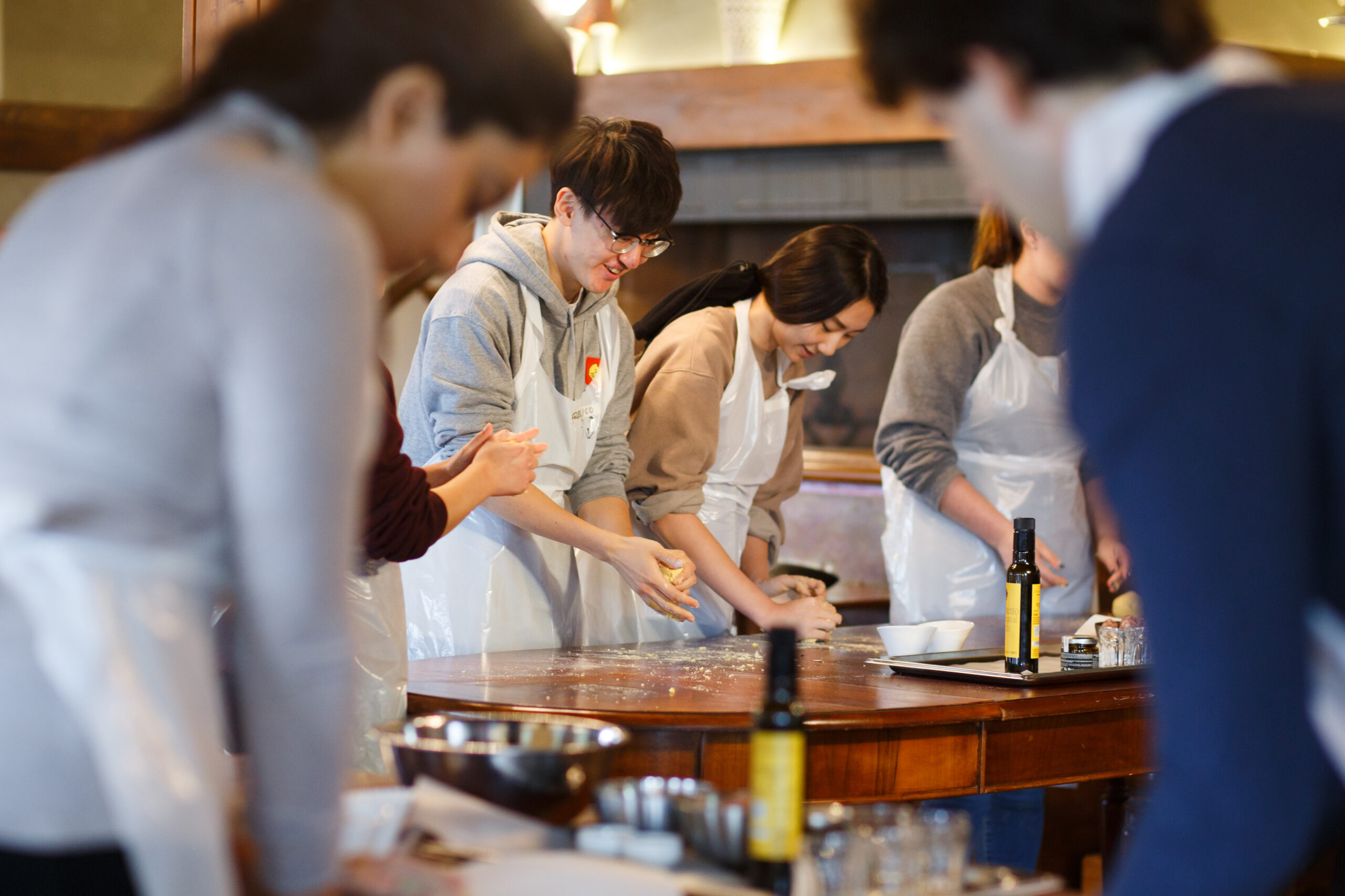 A group of student preparing food in a cooking class.