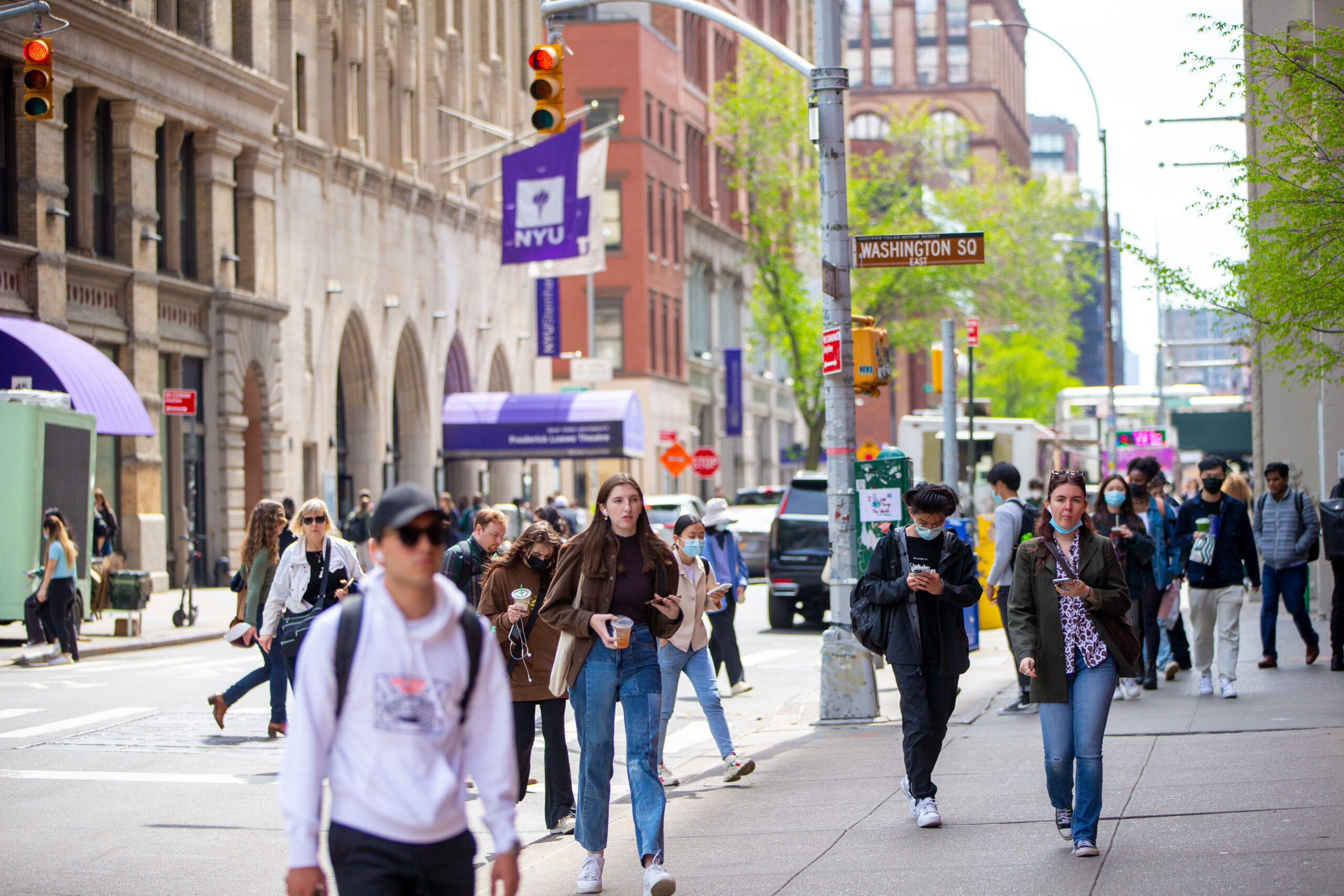 Students walking on the NYU campus.