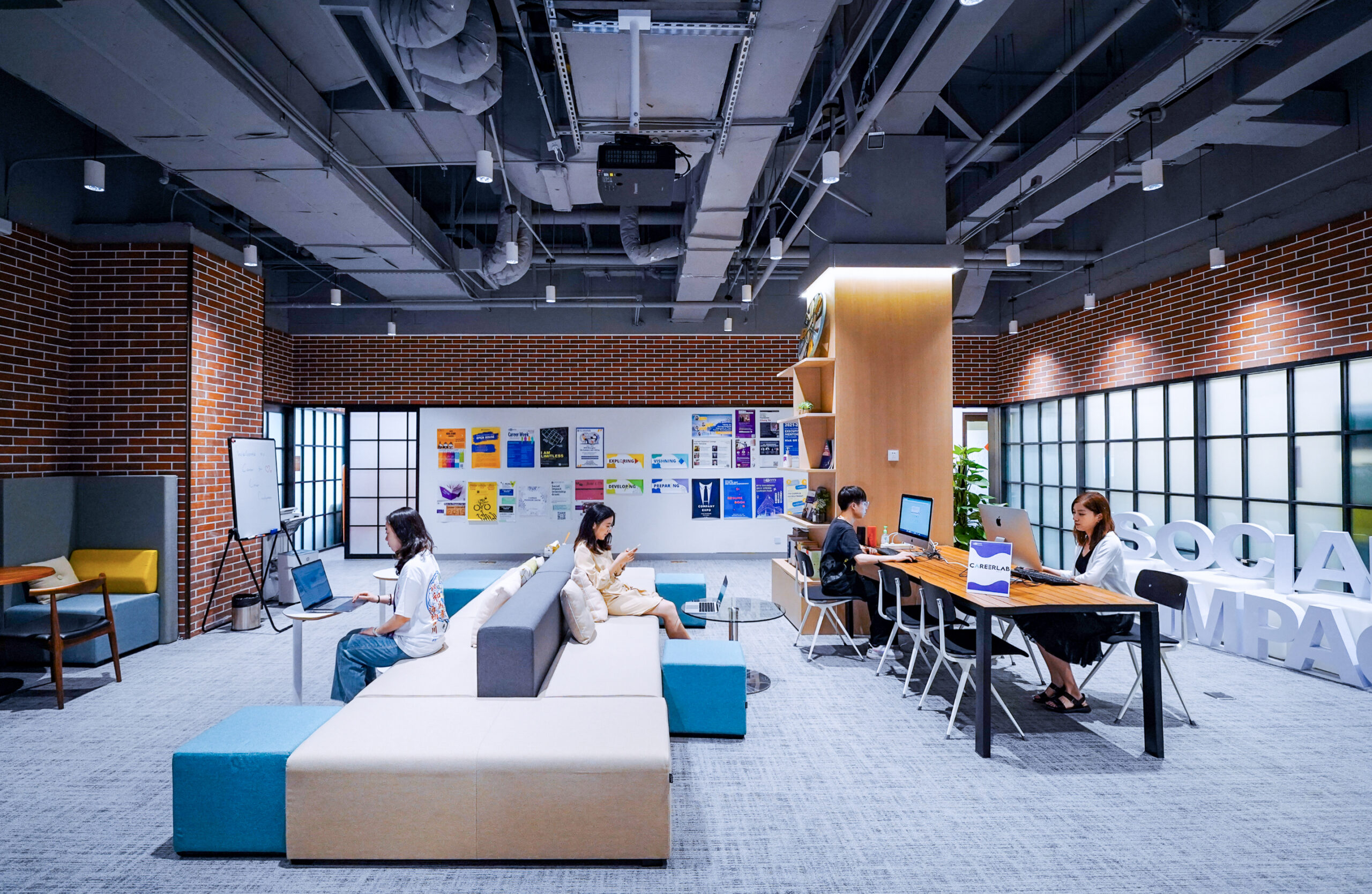 Students sit on couches in the Center for Career Development