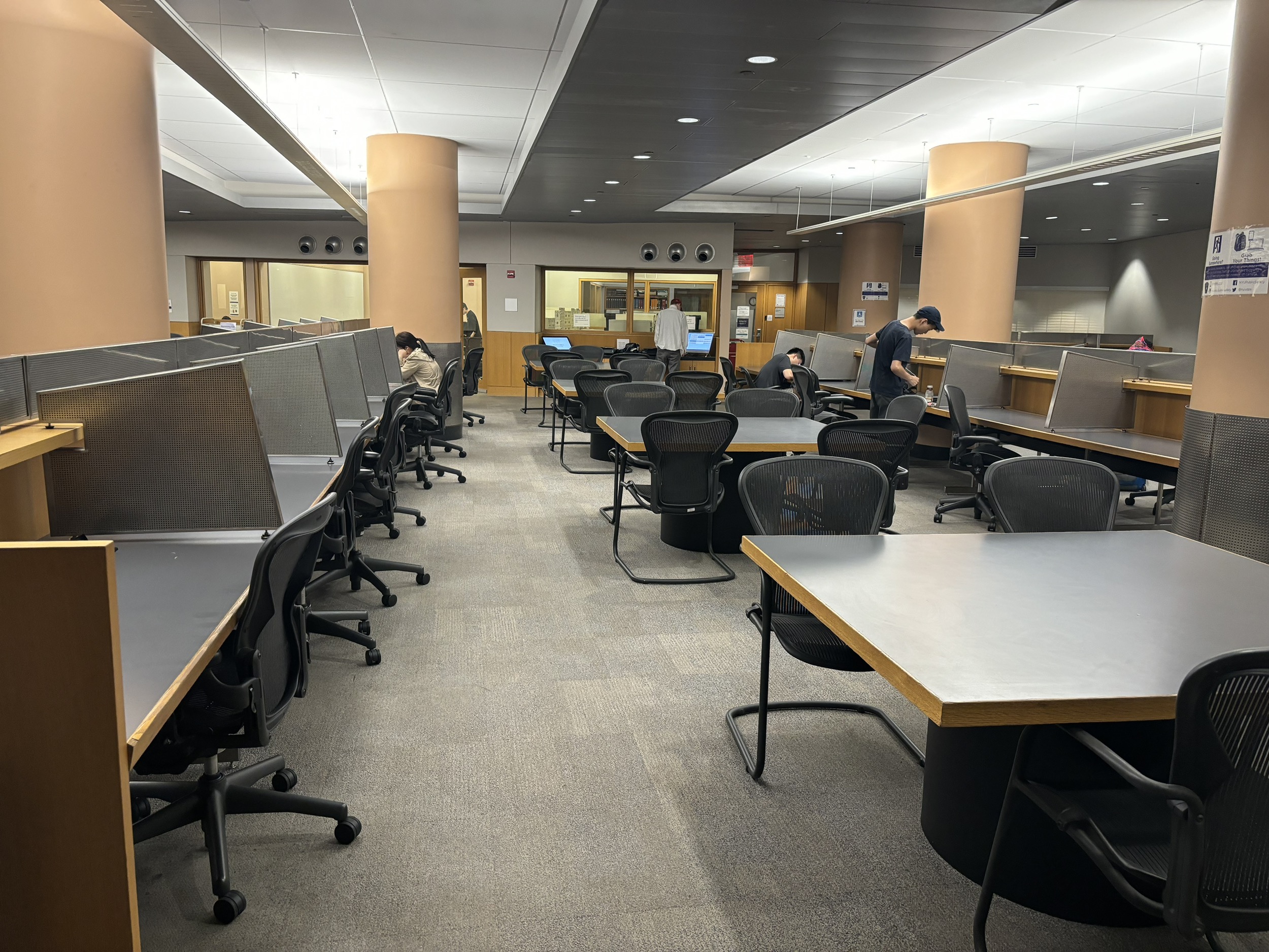 A view of the Bobst LL2 study area with rows of screened desks