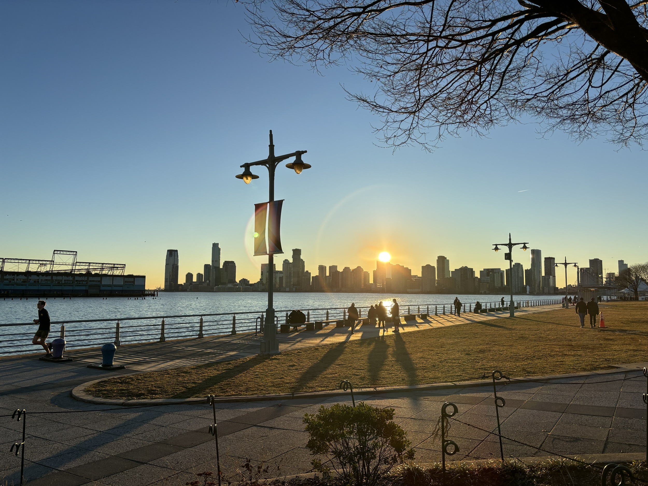 A view of the Hudson River from Pier 46 at sunset