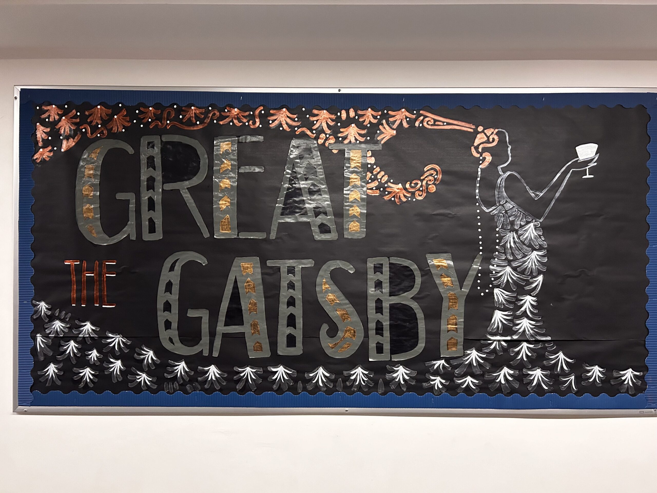 Hall decoration with glittery letters that spell out The Great Gatsby