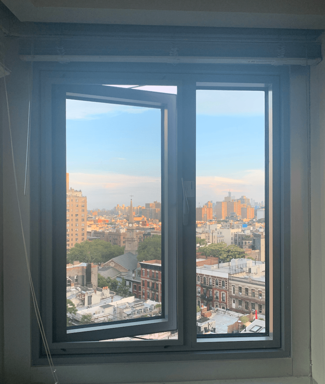 Window view of the East Village from a residence hall window