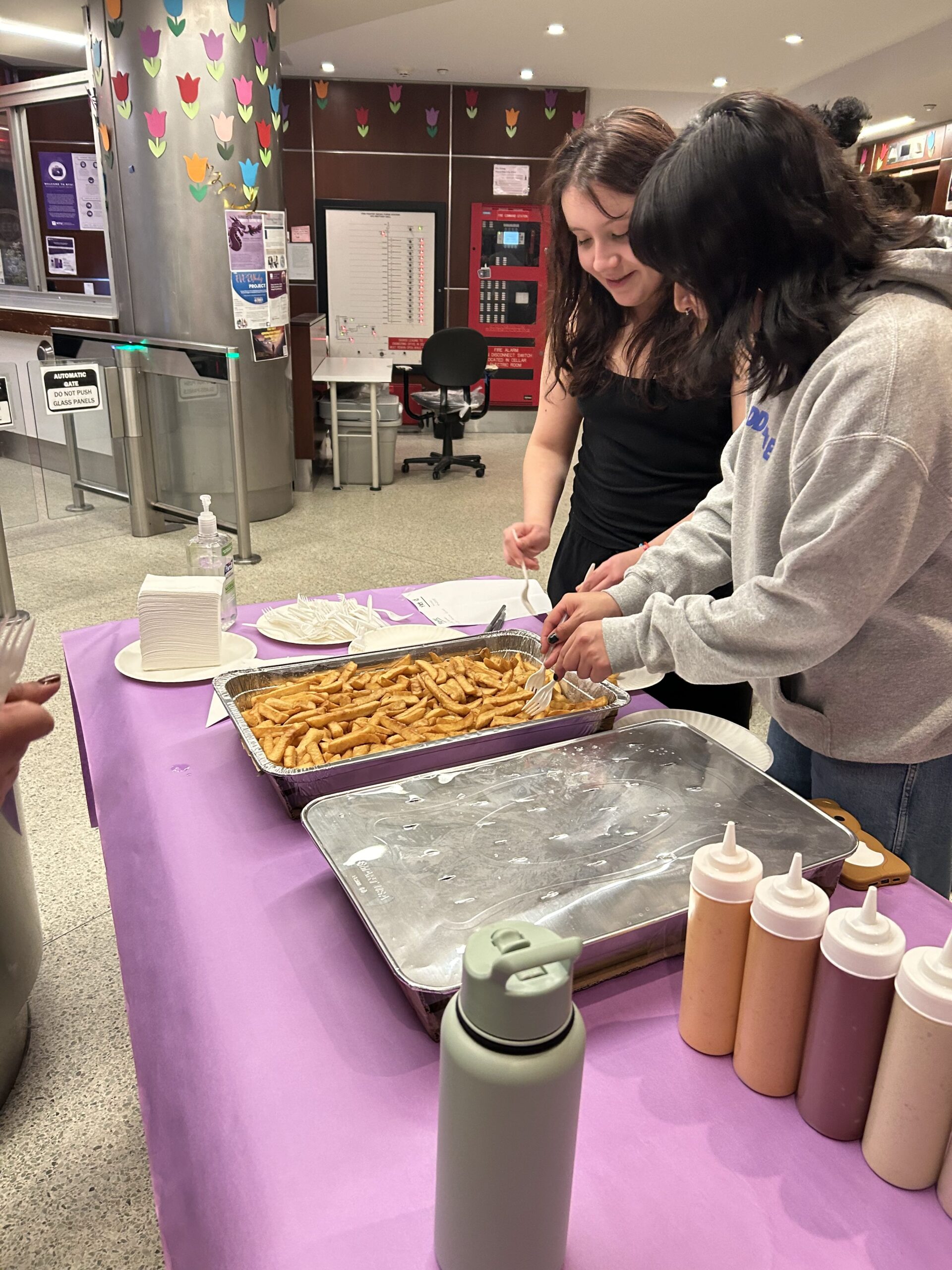 Students getting food during a resident event.