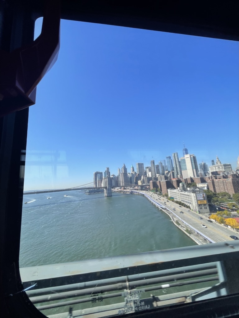 The view of the New York City skyline from a shuttle traveling from Manhattan to Brooklyn.