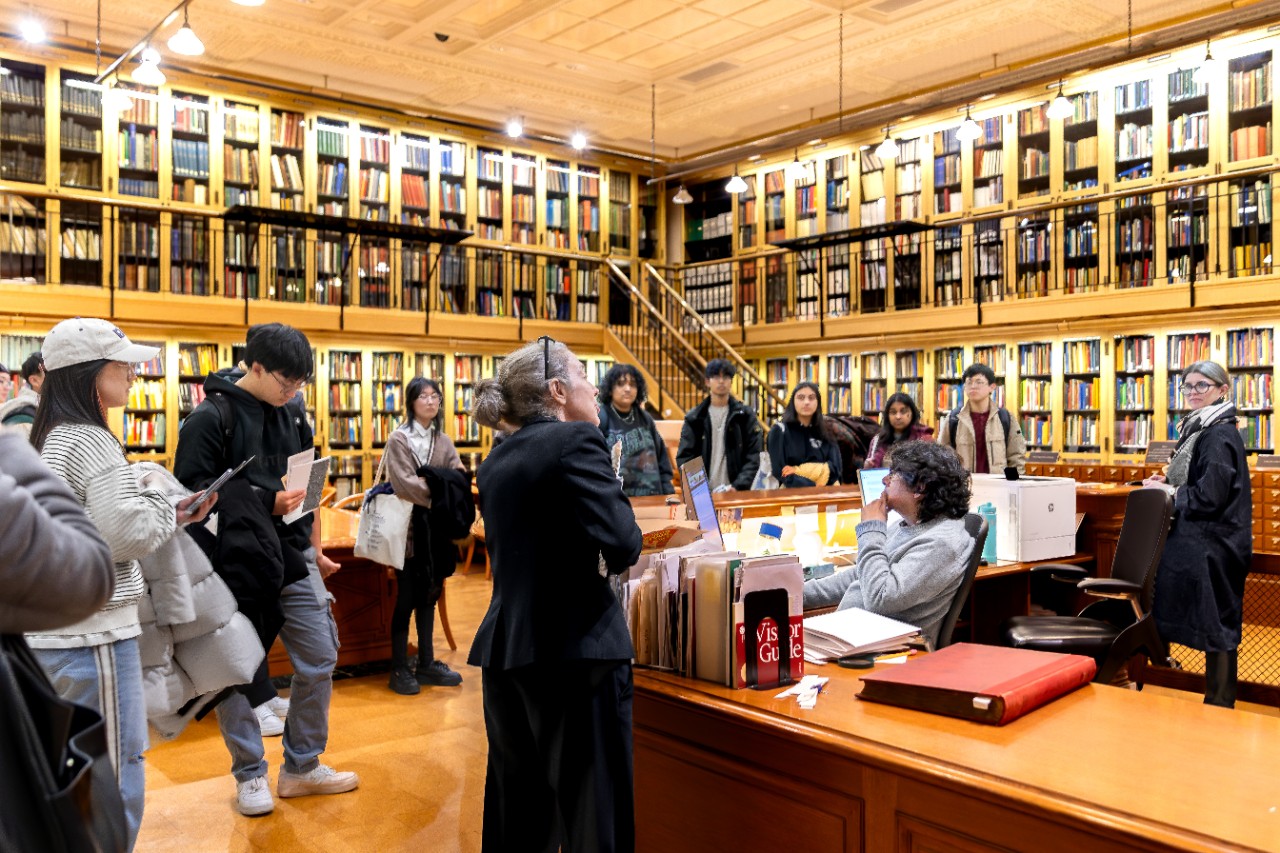 Students listen to a presentation in the NYPL's Art and Architecture Collection.