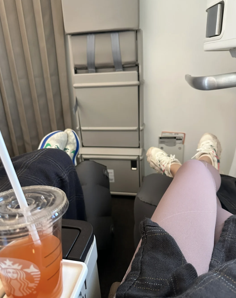 Plane passengers use footrests and waist pillows to alleviate pressure on their knees and backs.