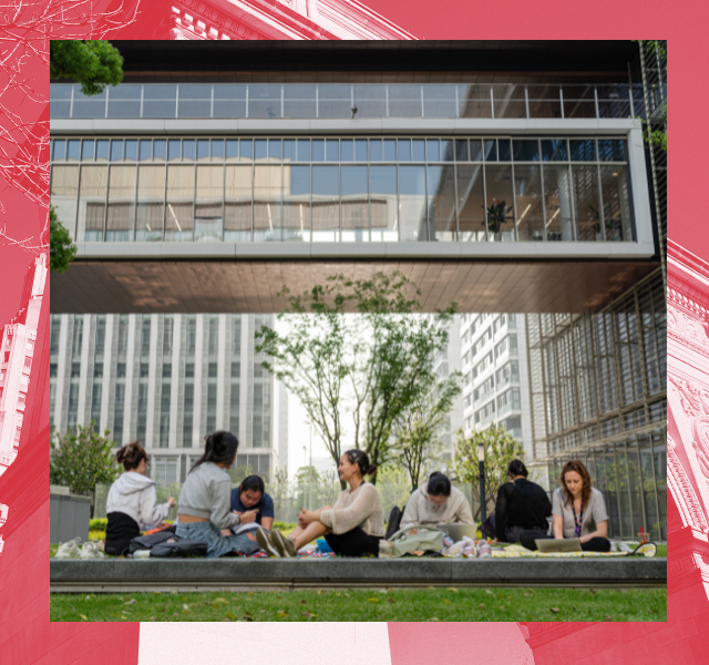 seven students sit on the NYUSH campus lawn