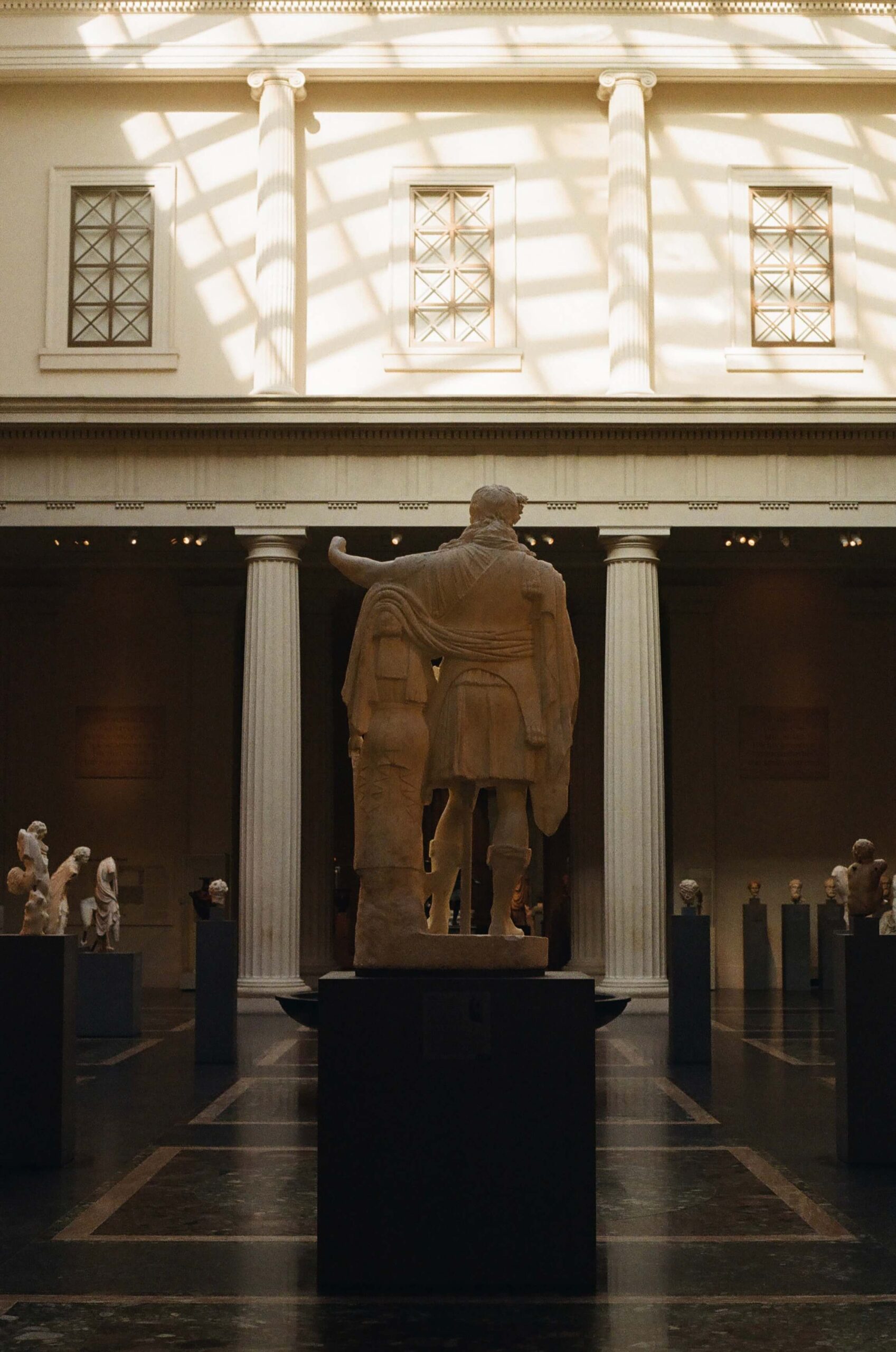 a marble statue in a museum