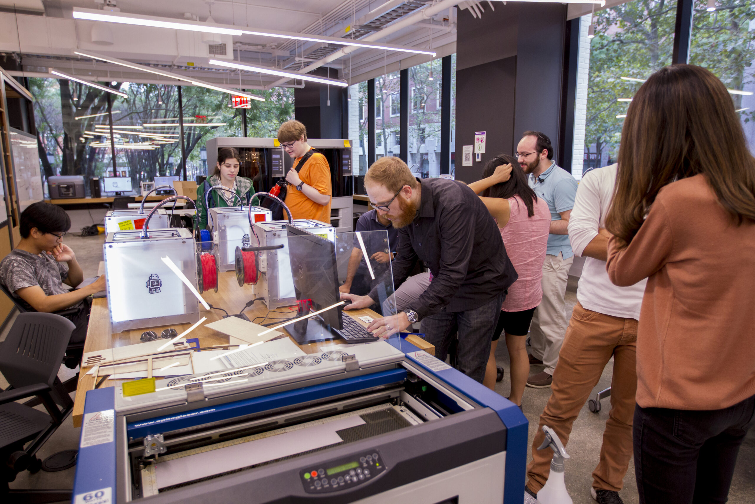 A group of students working in the Tandon Makerspace.