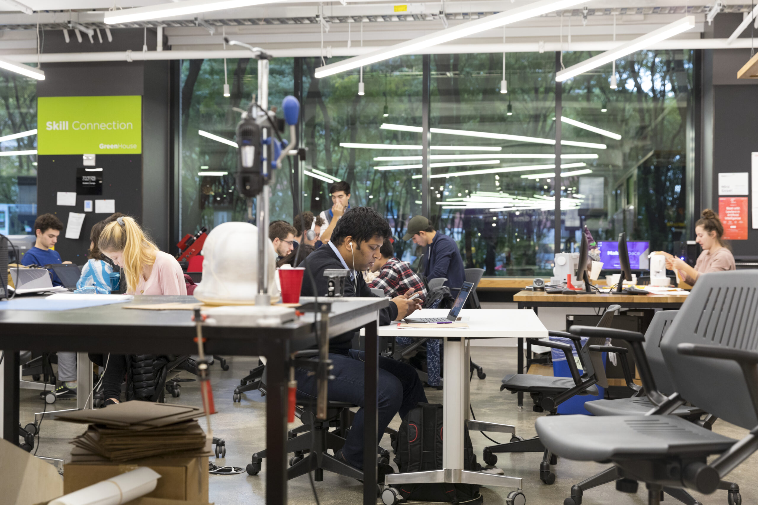 A group of students working in the Tandon Makerspace.