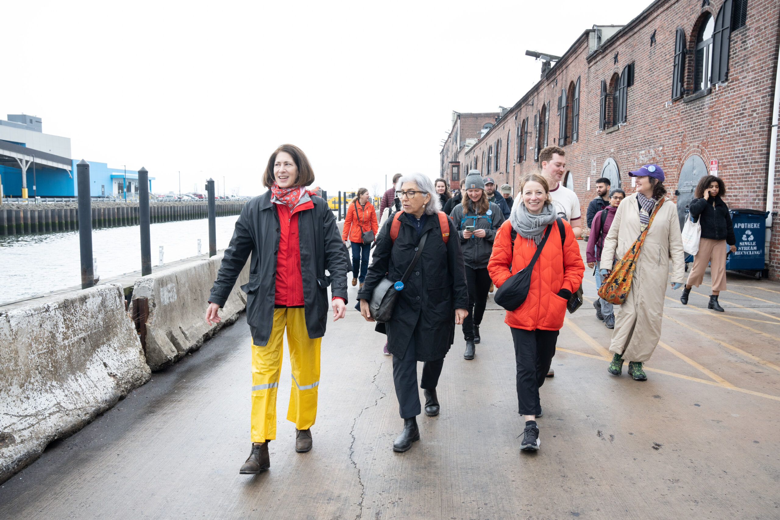 A group of students out of a tour with a professor