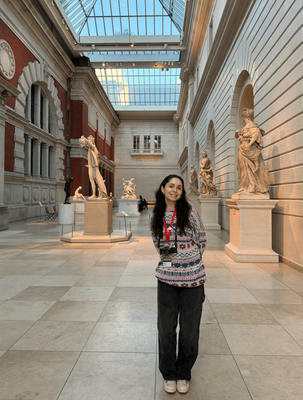 girl standing in museum gallery