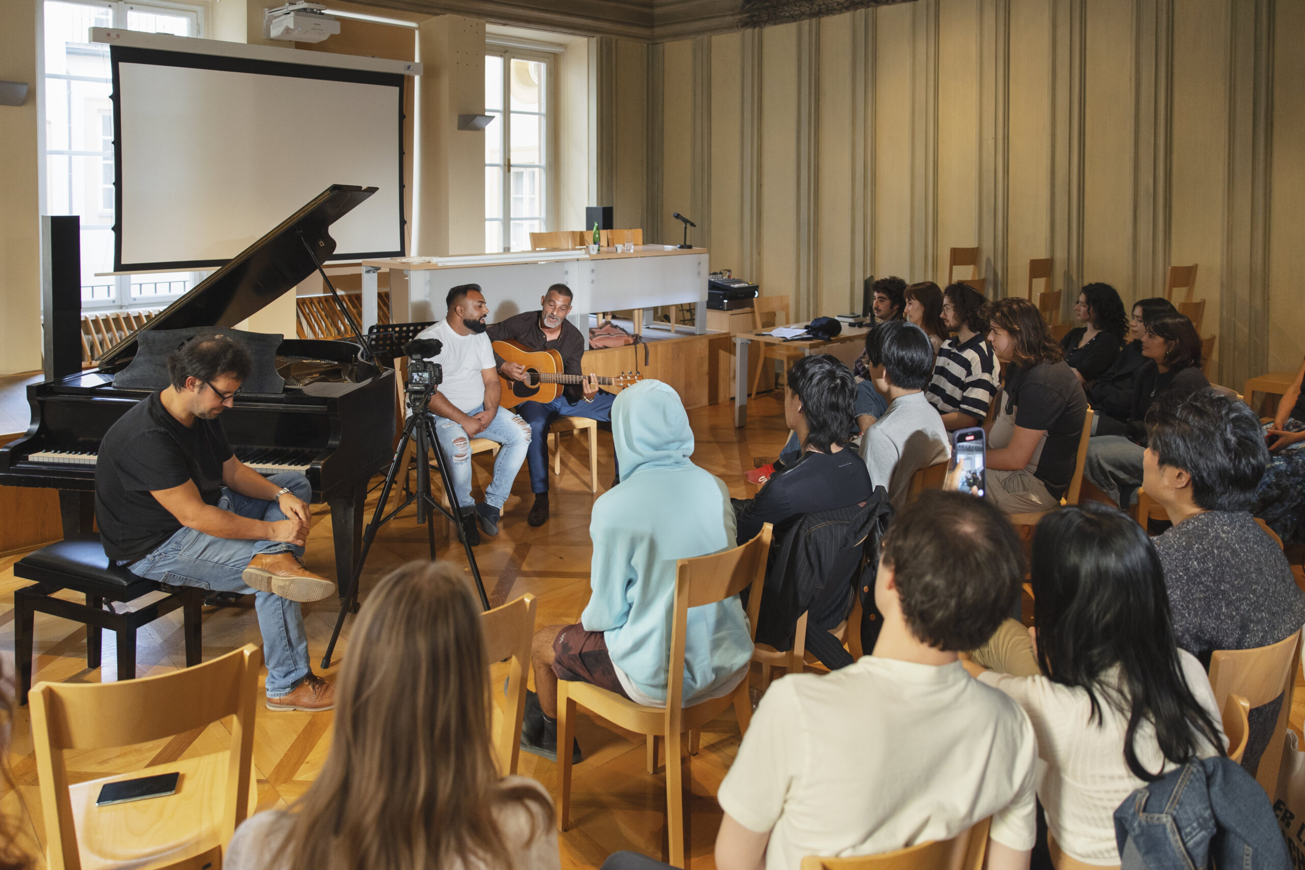 Students attending a music class.