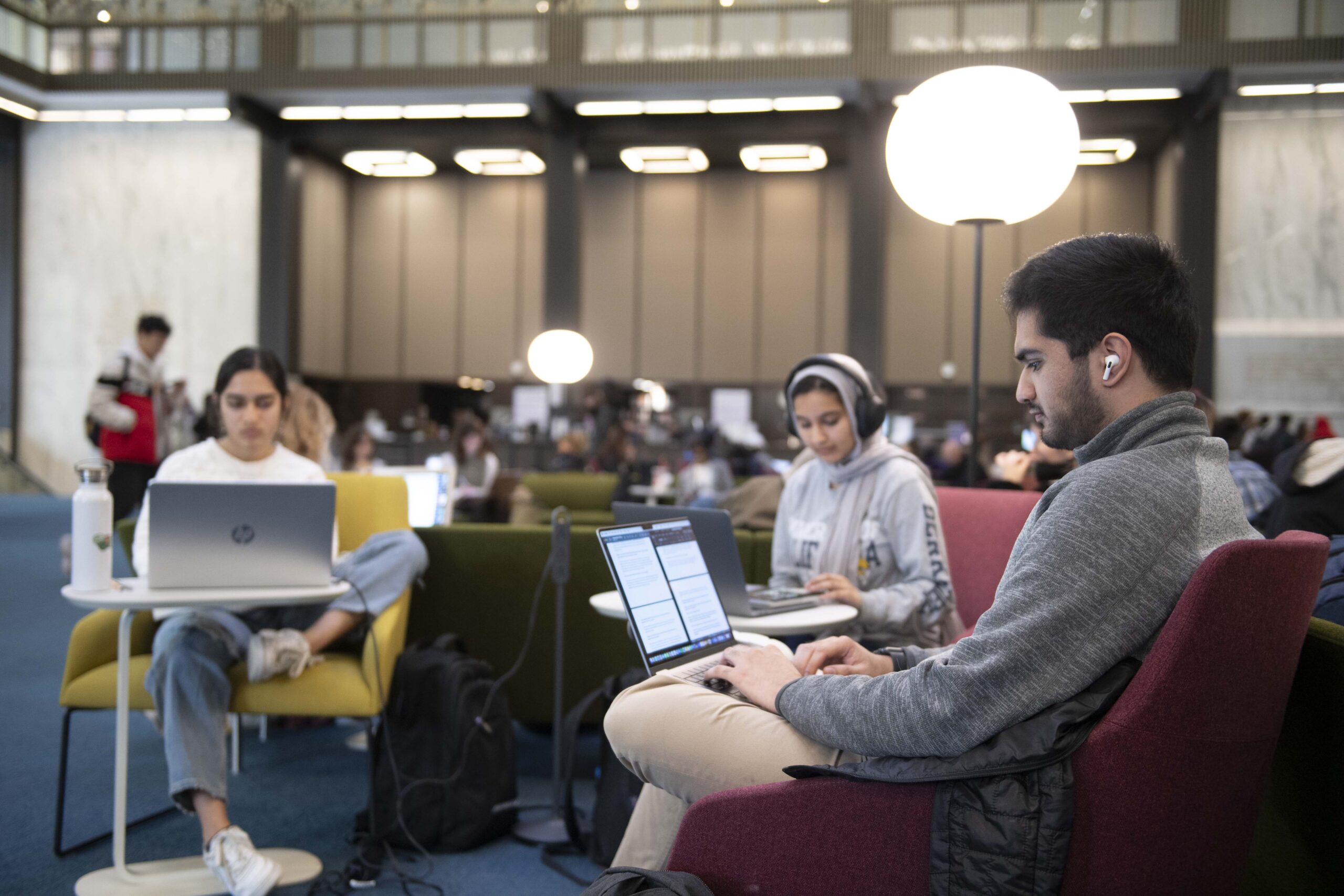 Students working in the Bobst Library