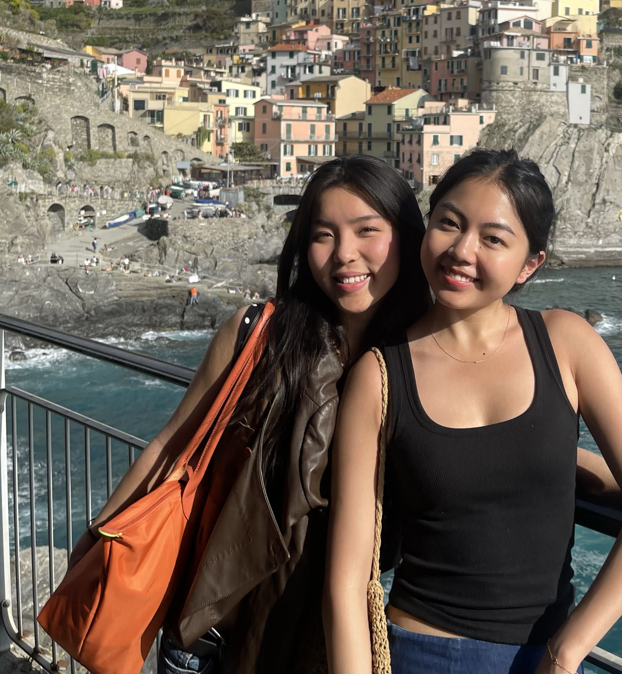 Angela Hong and Kathy Lin posing for a photo in Cinque Terre.