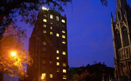 The exterior of student residence Brittany Hall at night