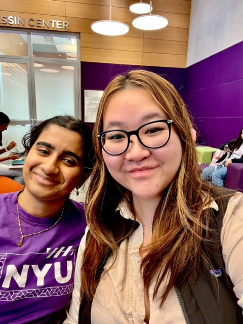 Stutee and Andrea, two NYU Stern students, smile at the camera