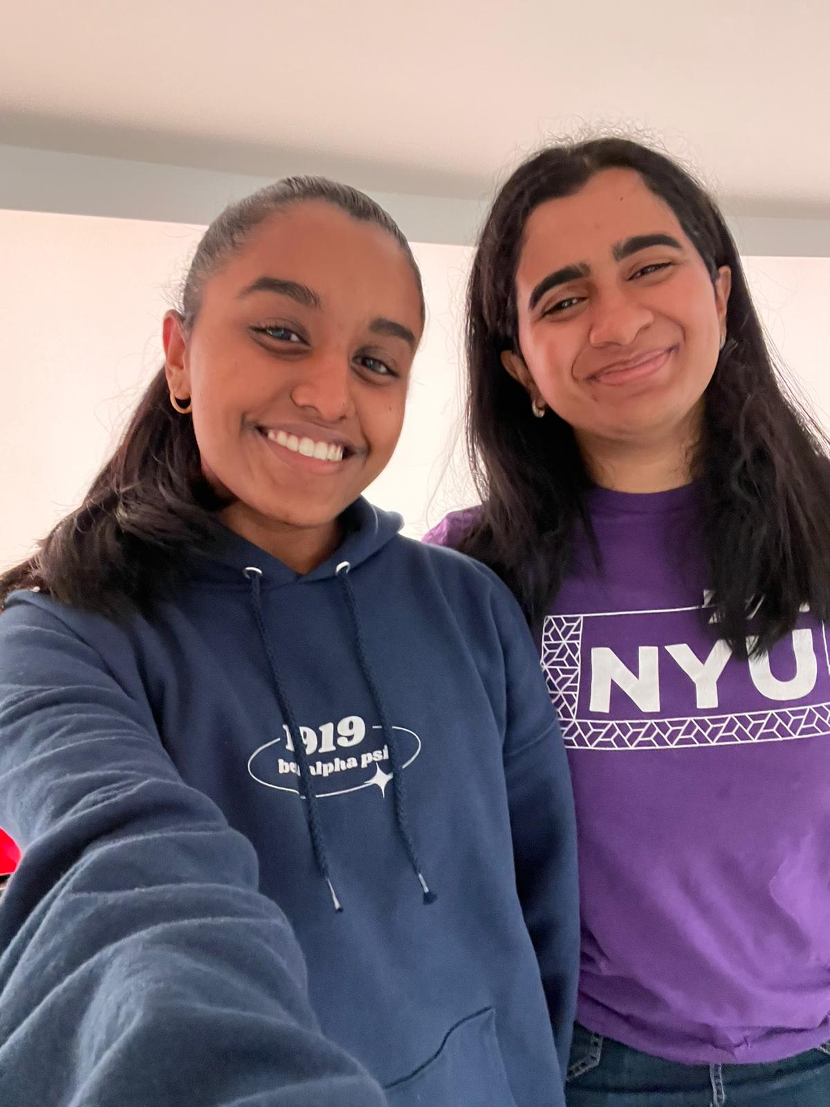 A smiling selfie of NYU students Renita and Stutee