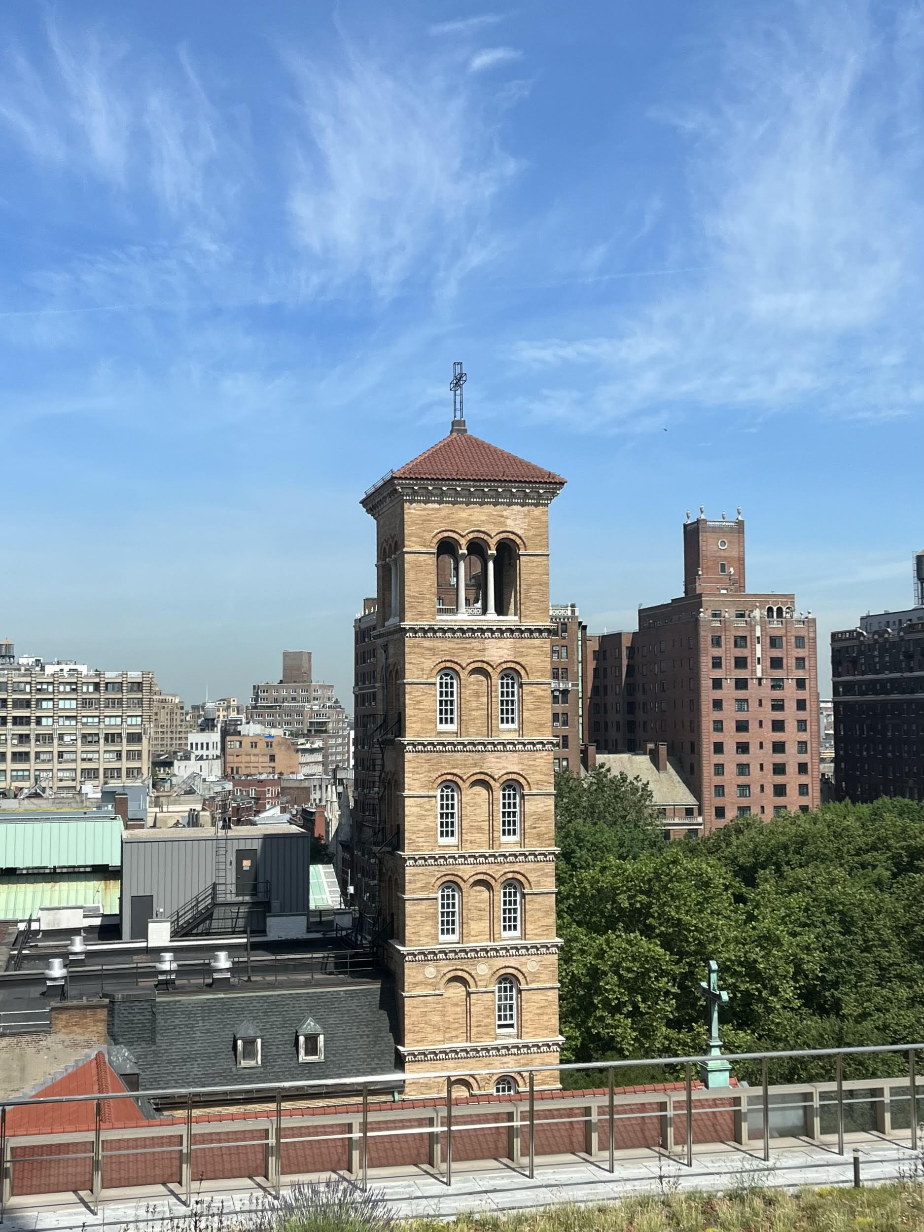 A tall building with distinct architecture stands out in the NYC skyline. This is where some NYU professors hold office hours.