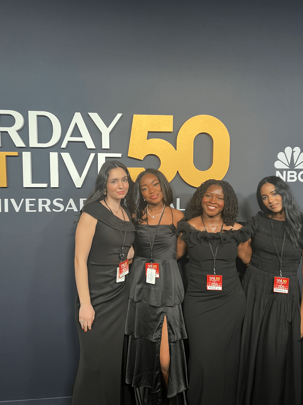 four girls in internship program on a red carpet