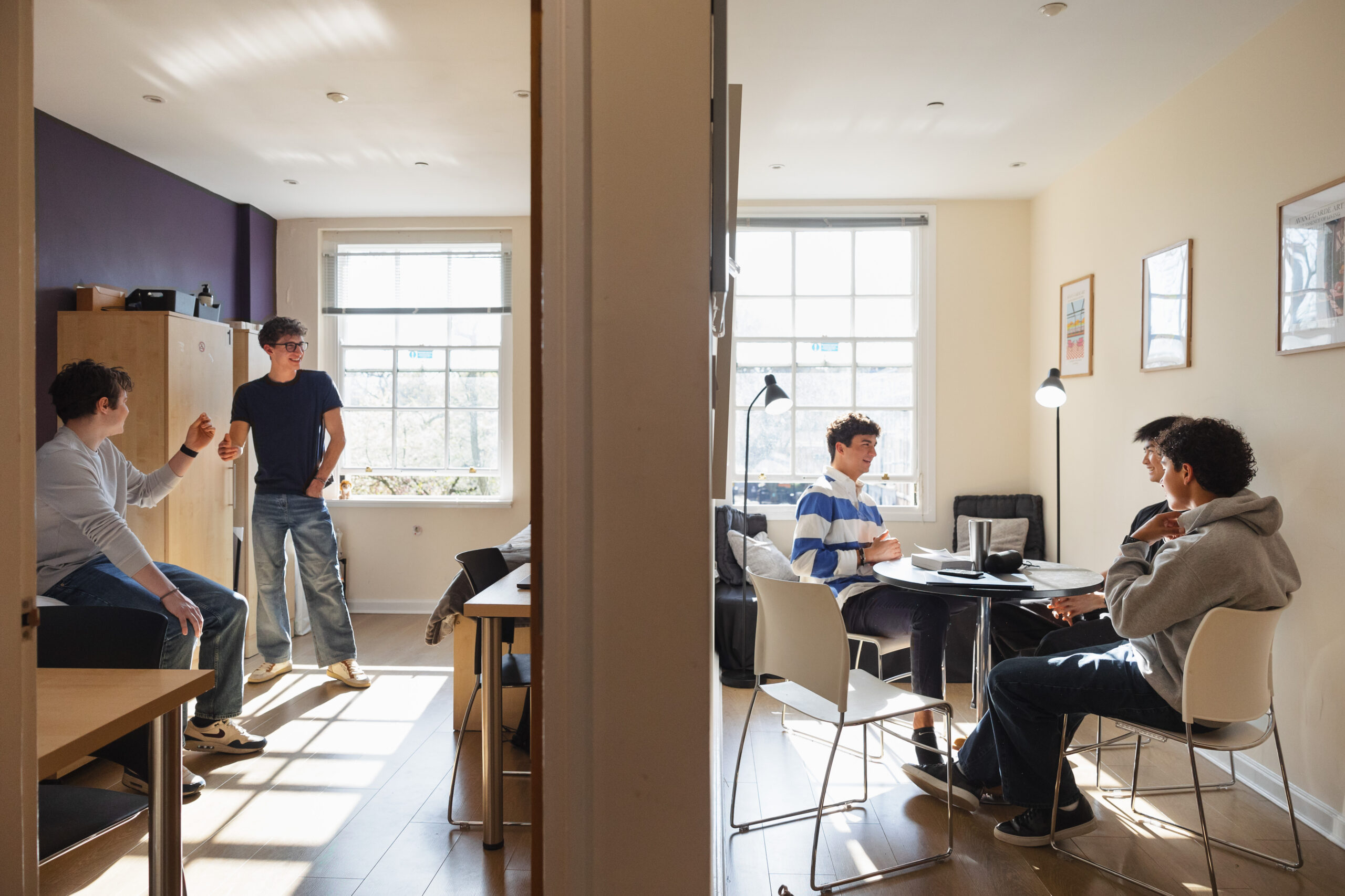 Students hanging out in two rooms of the dorms at NYU London.