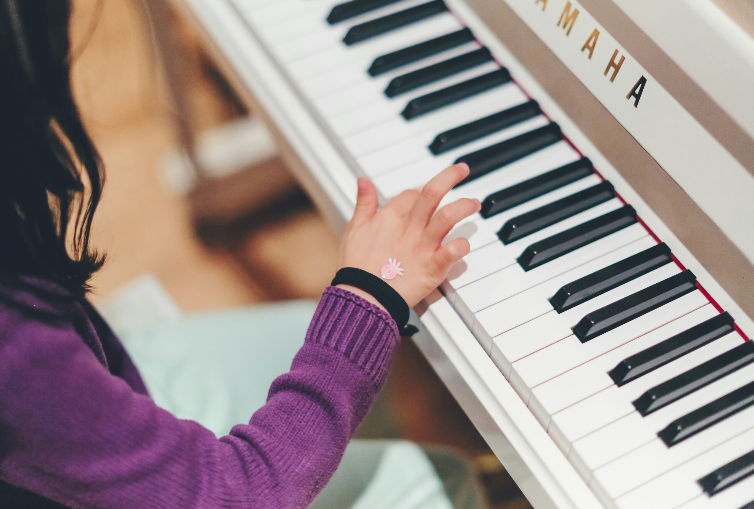 A student playing the piano