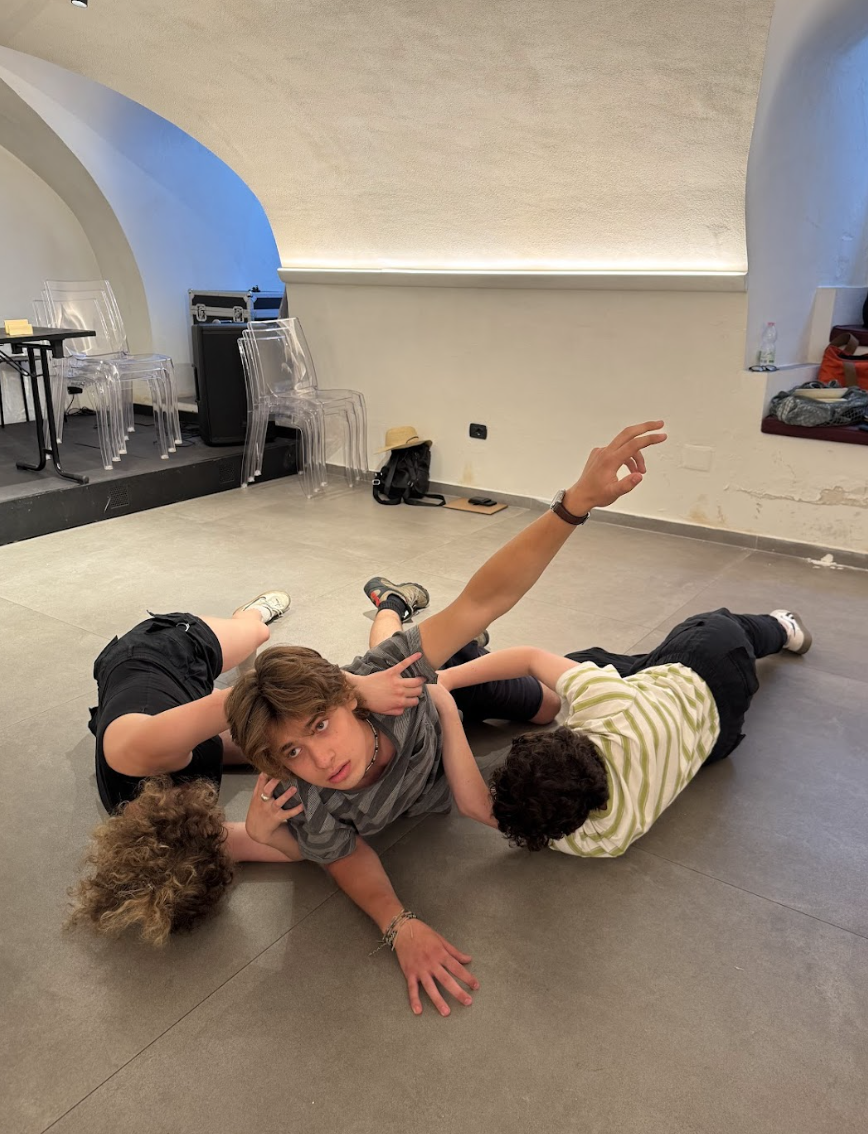 Students dramatize volcanic processes in a tableau