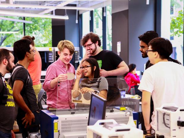 Students collaborating in the Makerspace