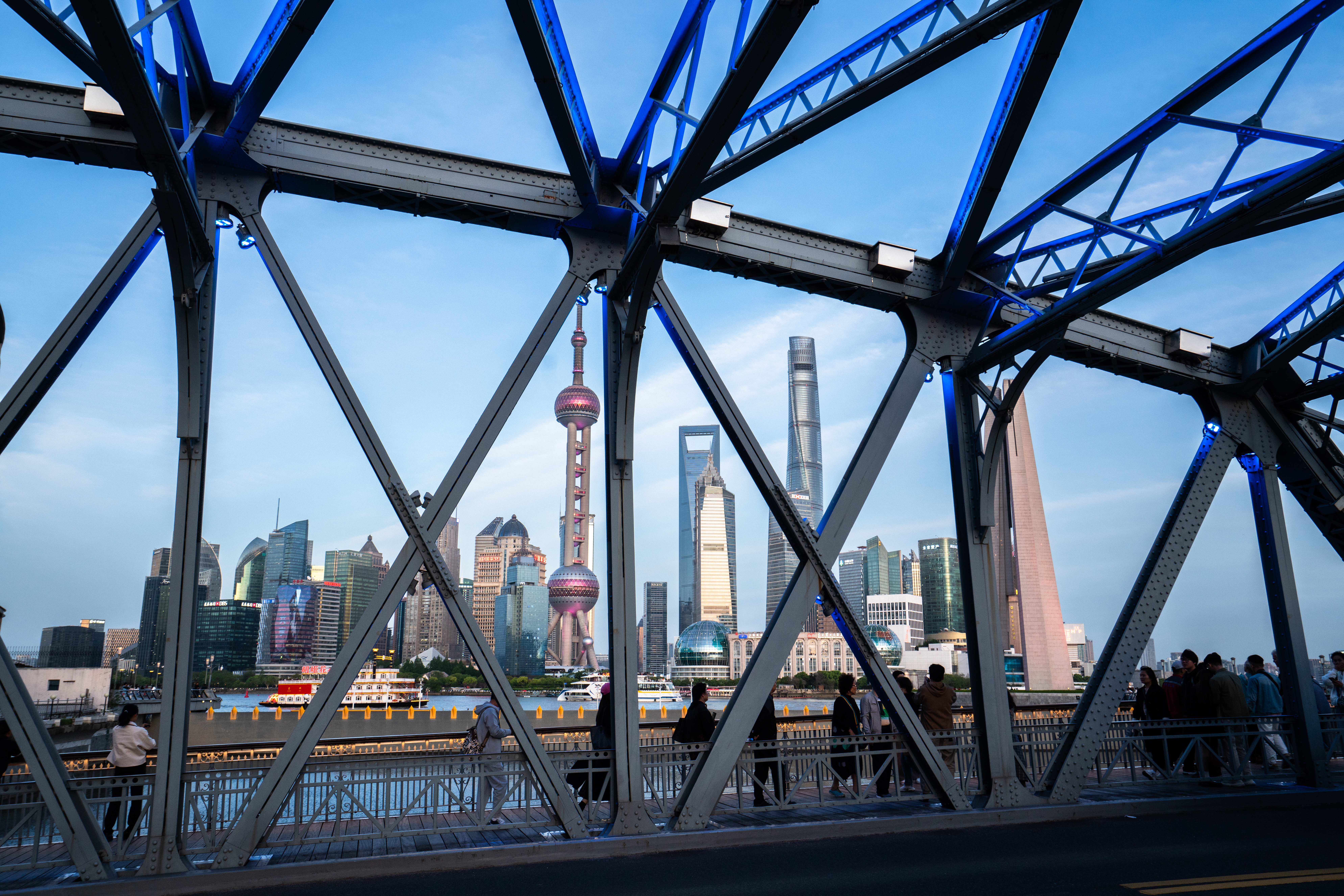 A view of the Shanghai skyline from a walkway.
