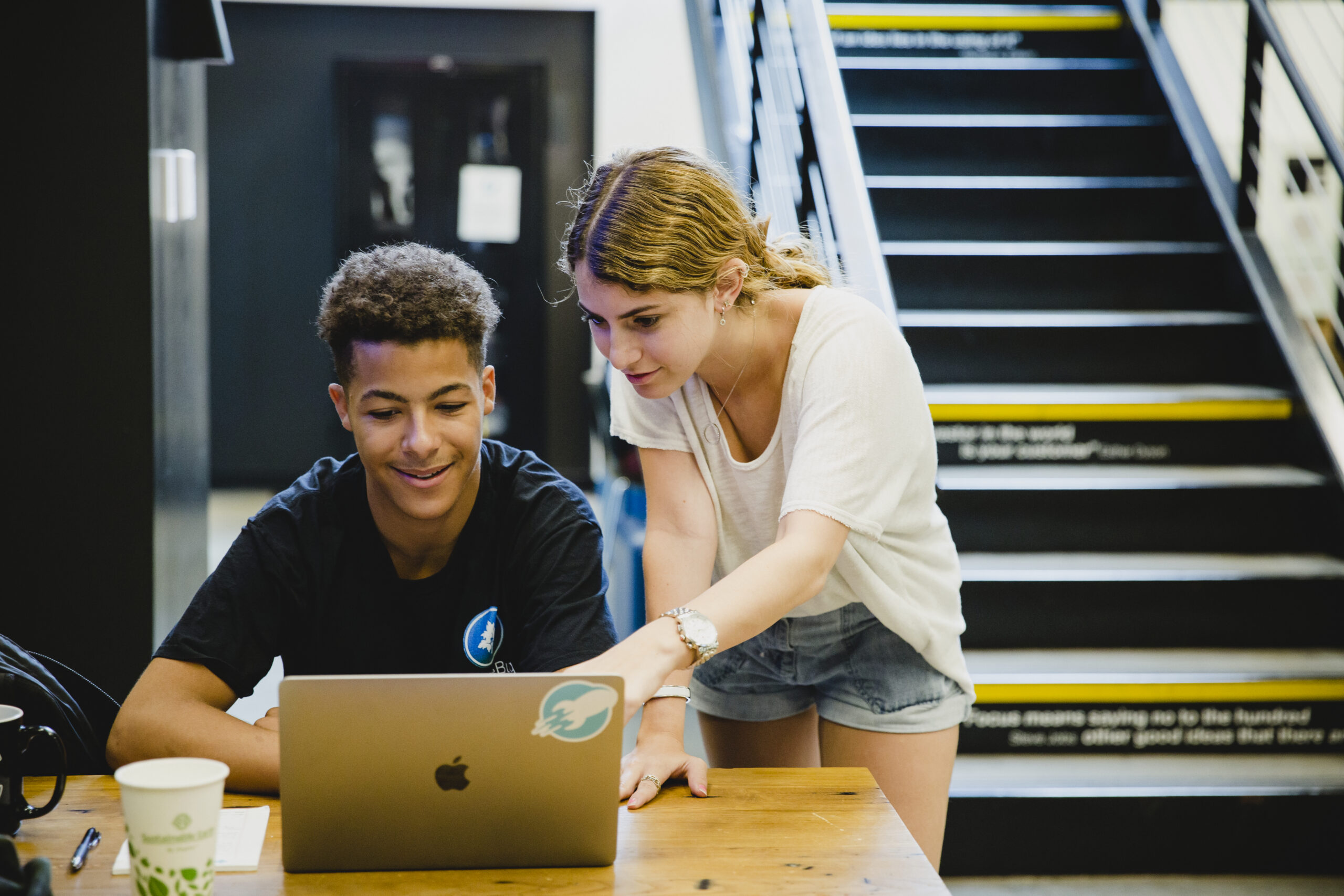 NYU students at a computer