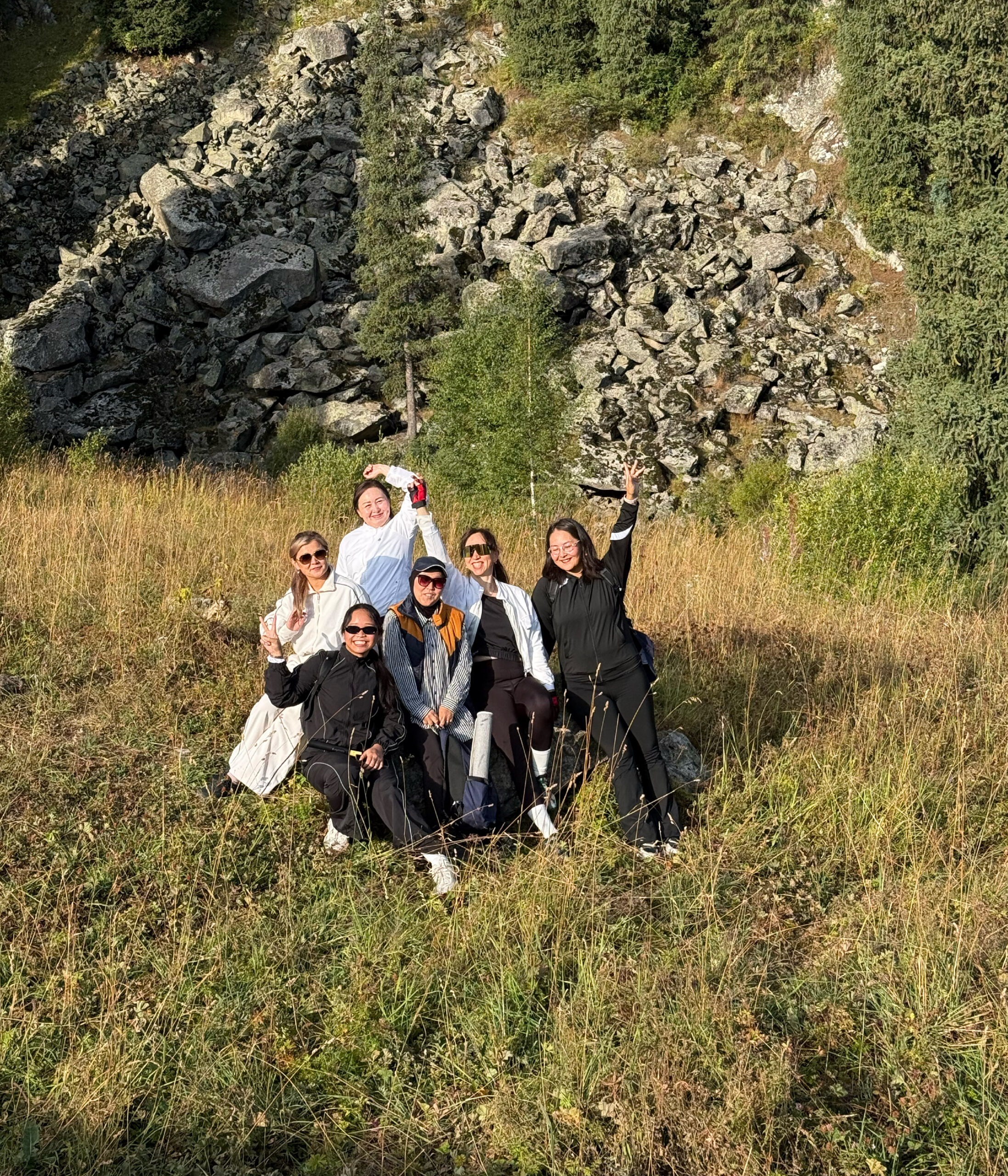 Brettany and friends in a grassy field.