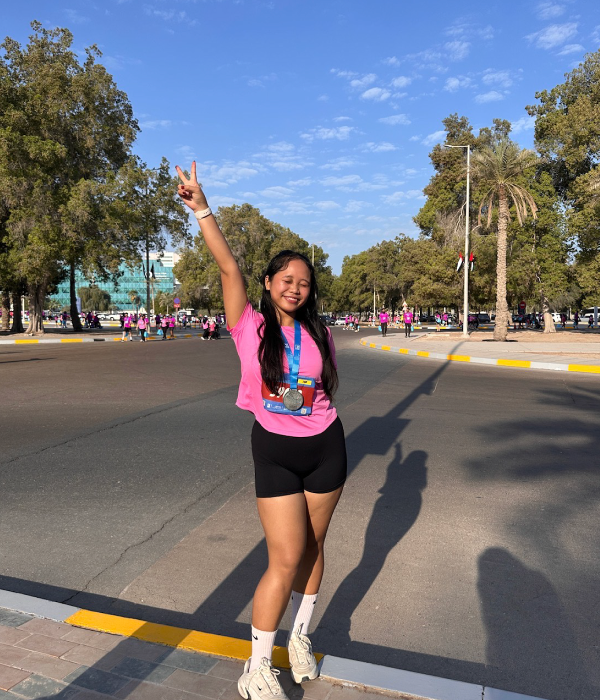 Brettany poses for a photo after a race.