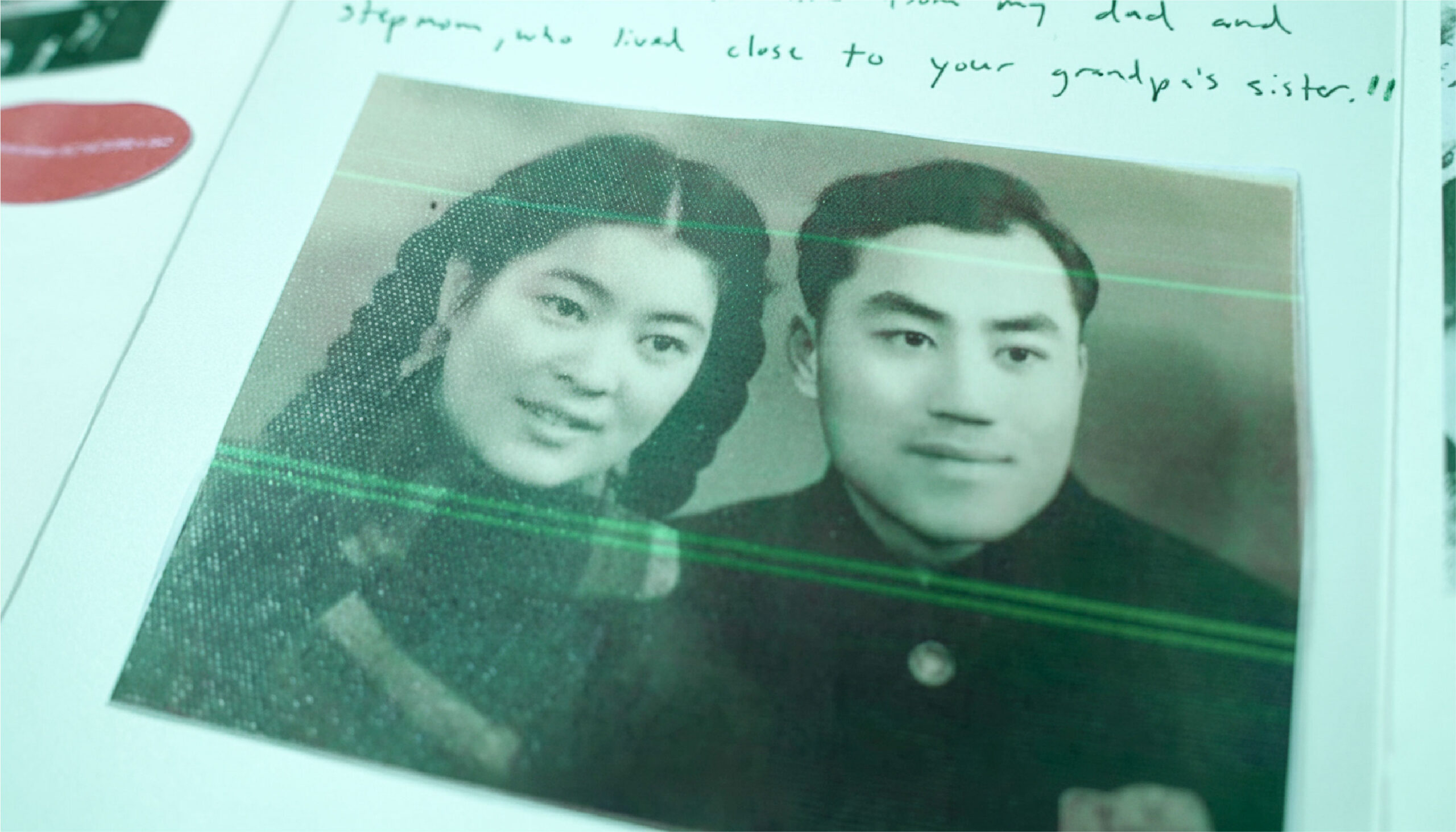 A photo of Addison Zhang's grandparents in their youth, pasted into a journal..