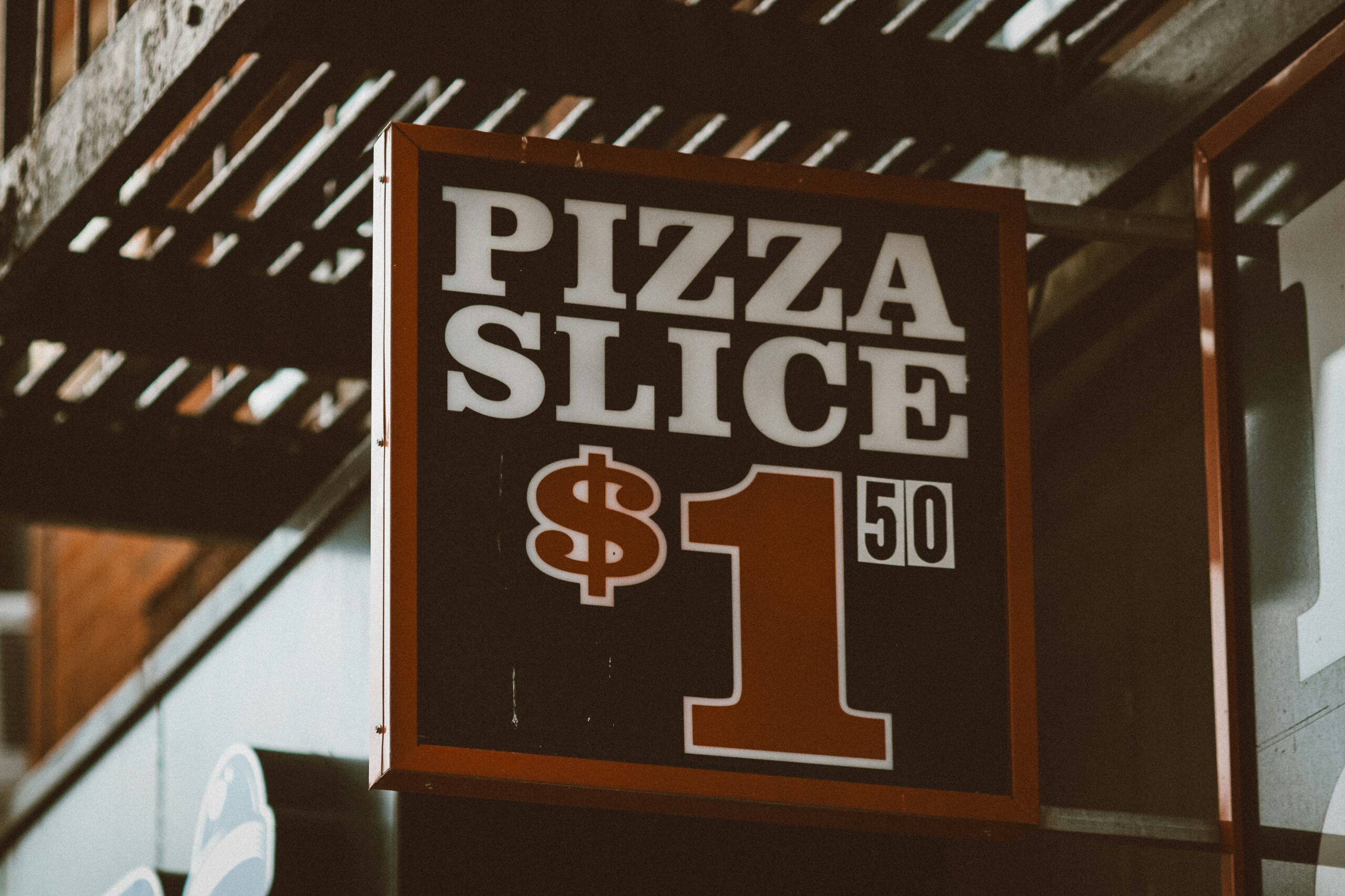 A vintage retail sign that reads 