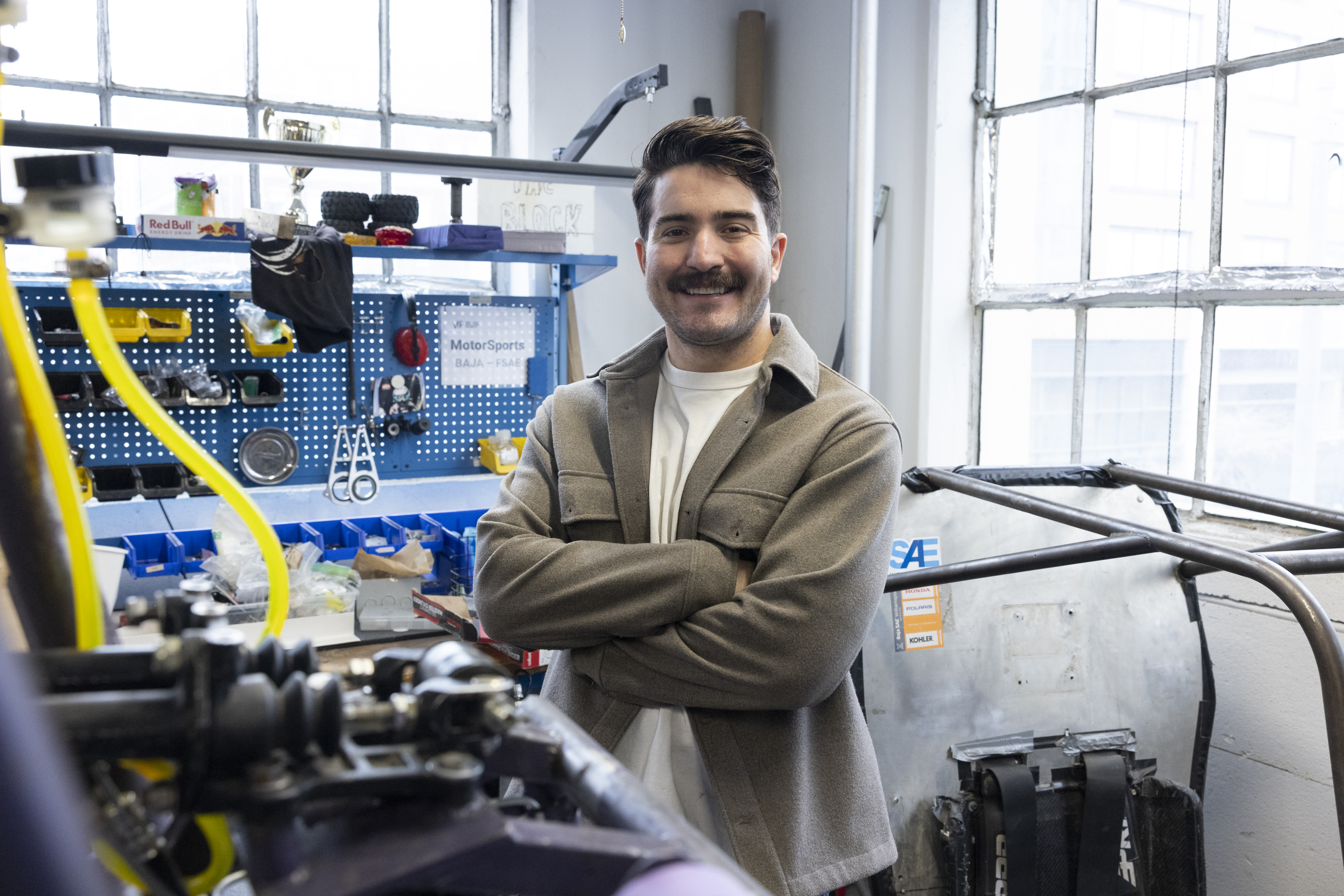 Vinnie Gallegos in a mechanical workspace