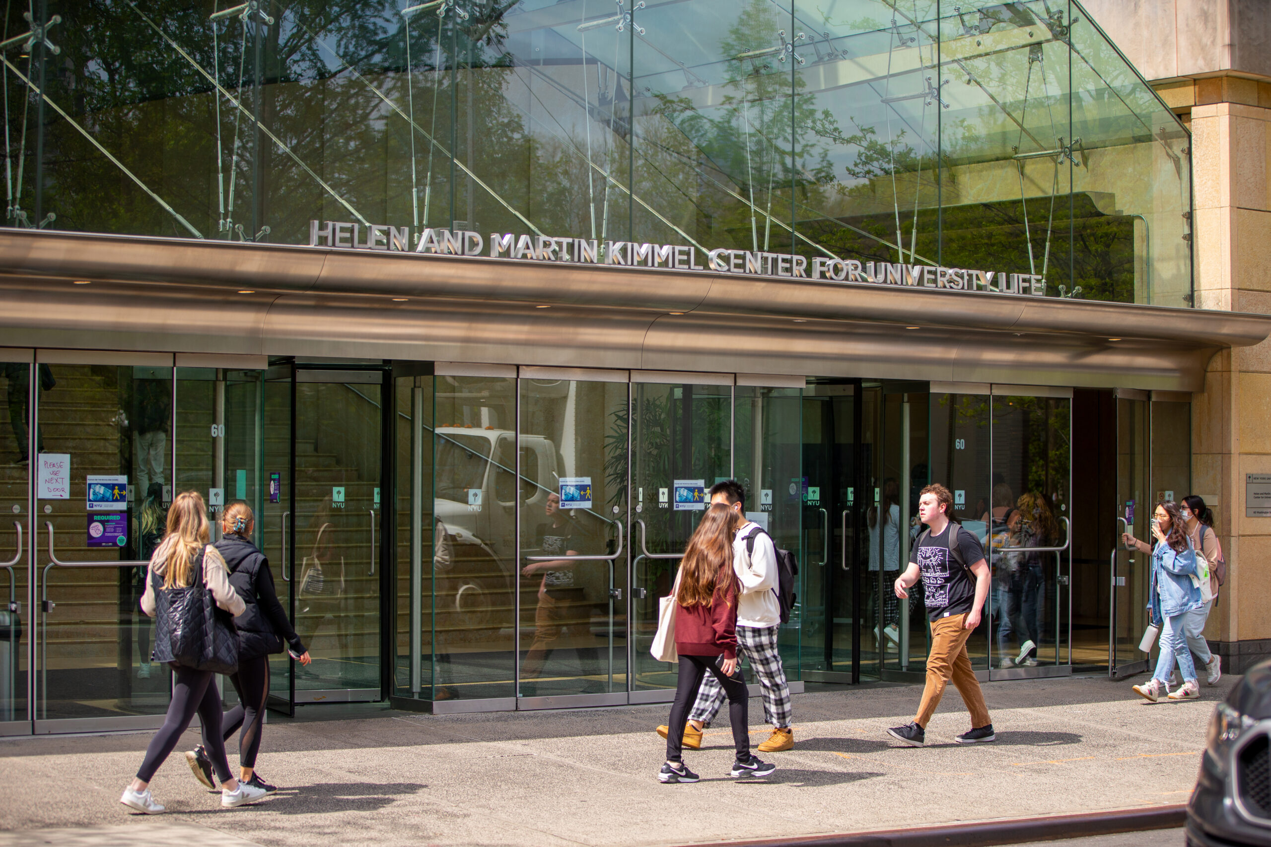 Students walking past the Kimmel Center on the NYU campus.