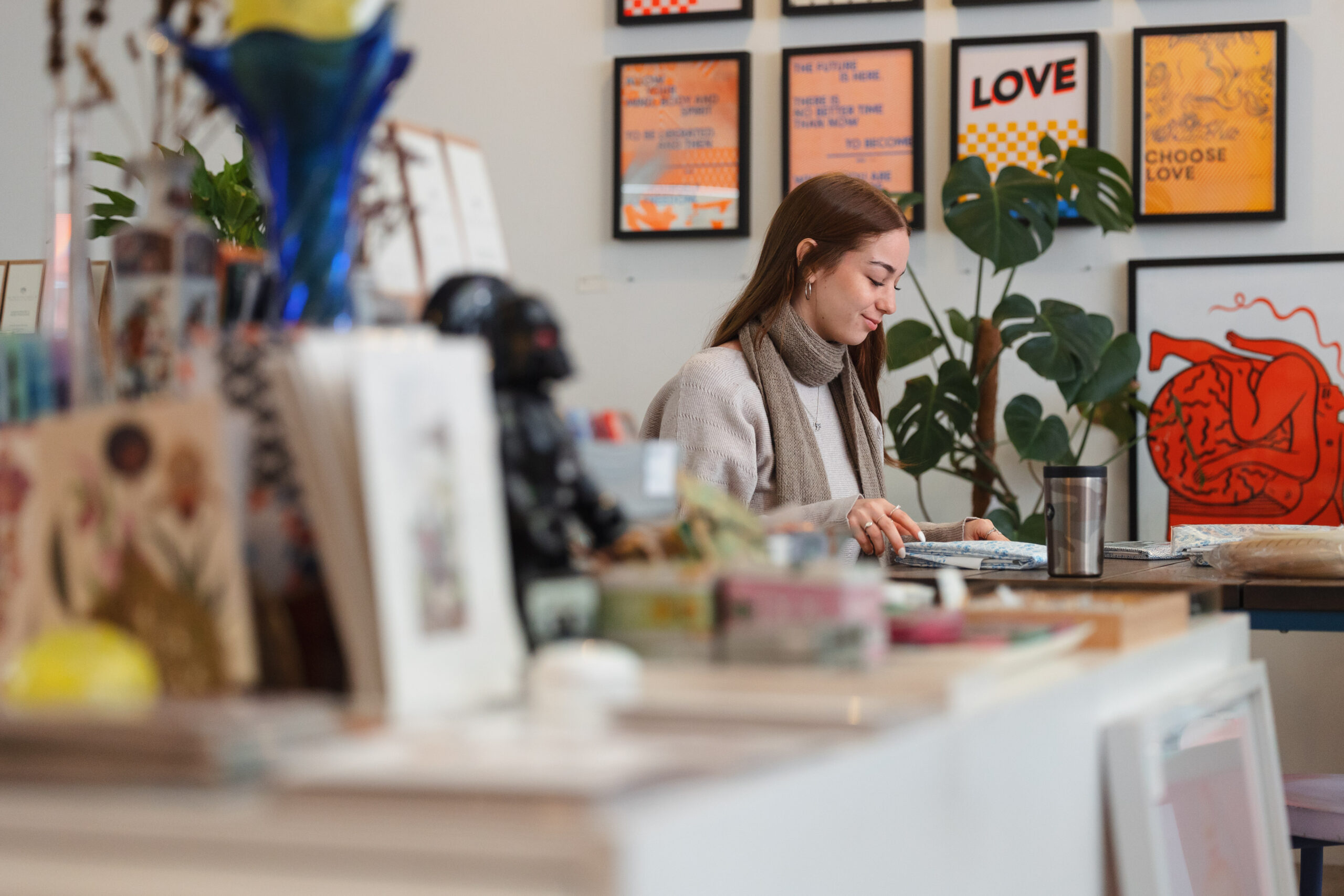 Maddy Bamba working at her internship at HELLO LOVE.