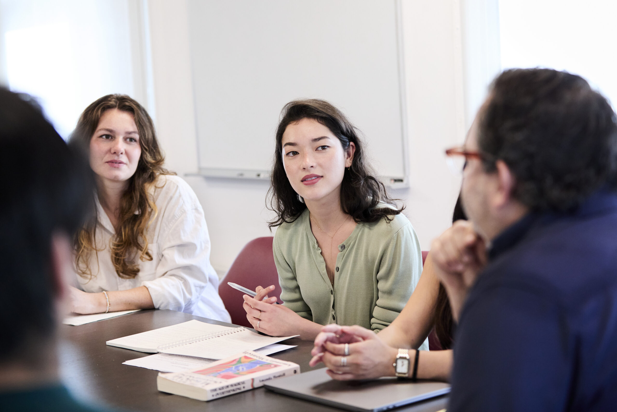 Students listen attentively during a seminar discussion.