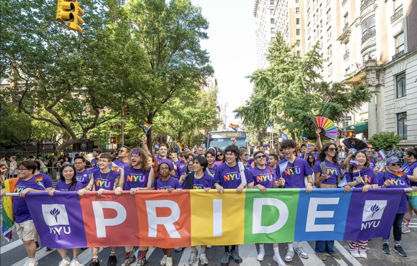 A large group of NYU community members march at the NYC Pride Parade.